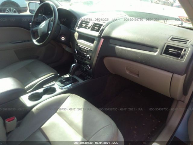 Photo 4 VIN: 3FADP0L37BR142647 - FORD FUSION 