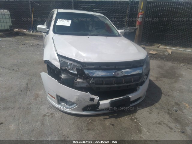 Photo 5 VIN: 3FADP0L38AR142879 - FORD FUSION 