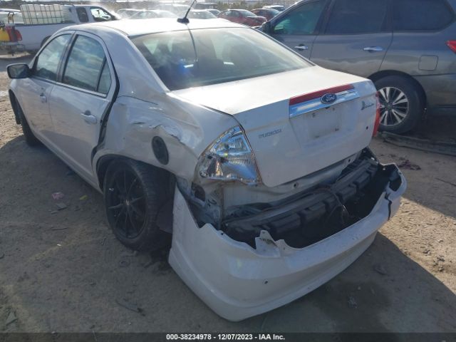 Photo 5 VIN: 3FADP0L39CR258336 - FORD FUSION HYBRID 