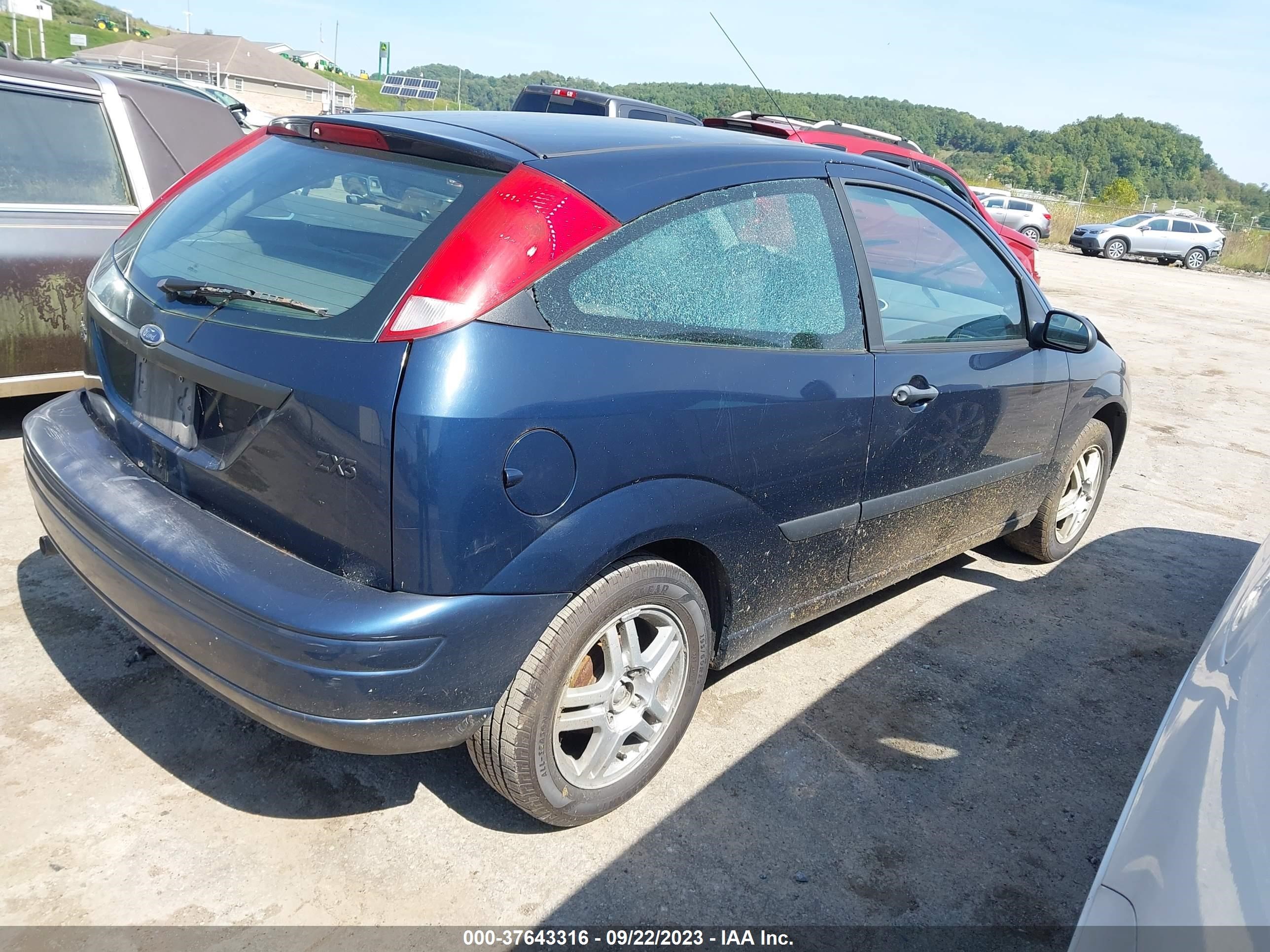 Photo 3 VIN: 3FAFP31323R117721 - FORD FOCUS 