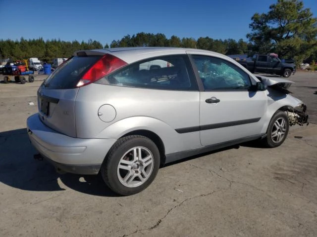 Photo 2 VIN: 3FAFP3135YR132284 - FORD FOCUS ZX3 