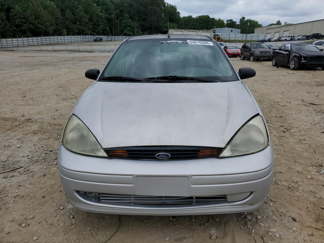 Photo 4 VIN: 3FAFP3138YR203204 - FORD FOCUS 