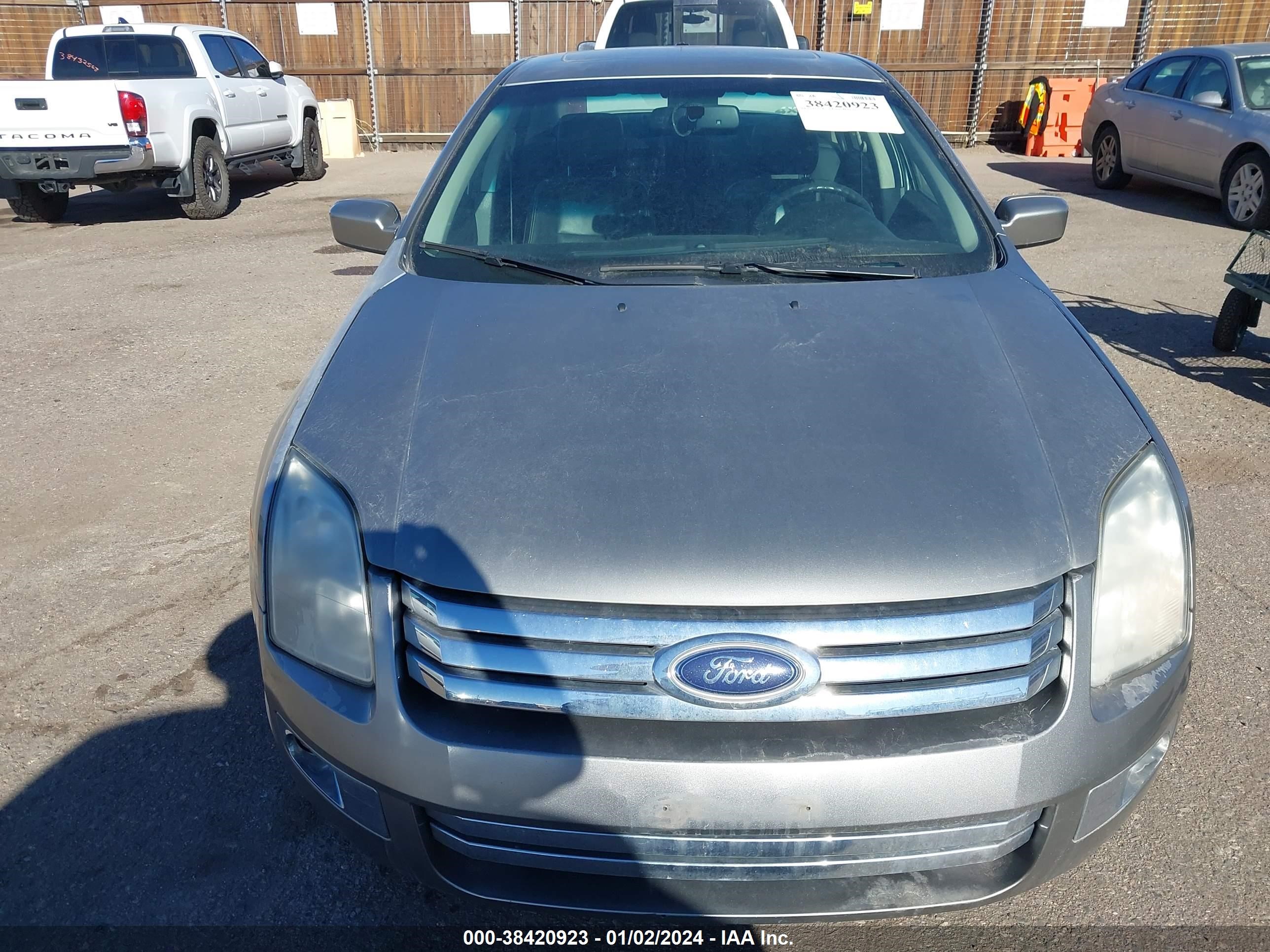 Photo 11 VIN: 3FAHP02138R112619 - FORD FUSION 