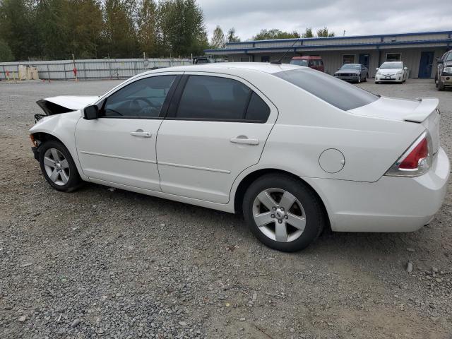 Photo 1 VIN: 3FAHP071X9R147183 - FORD FUSION SE 