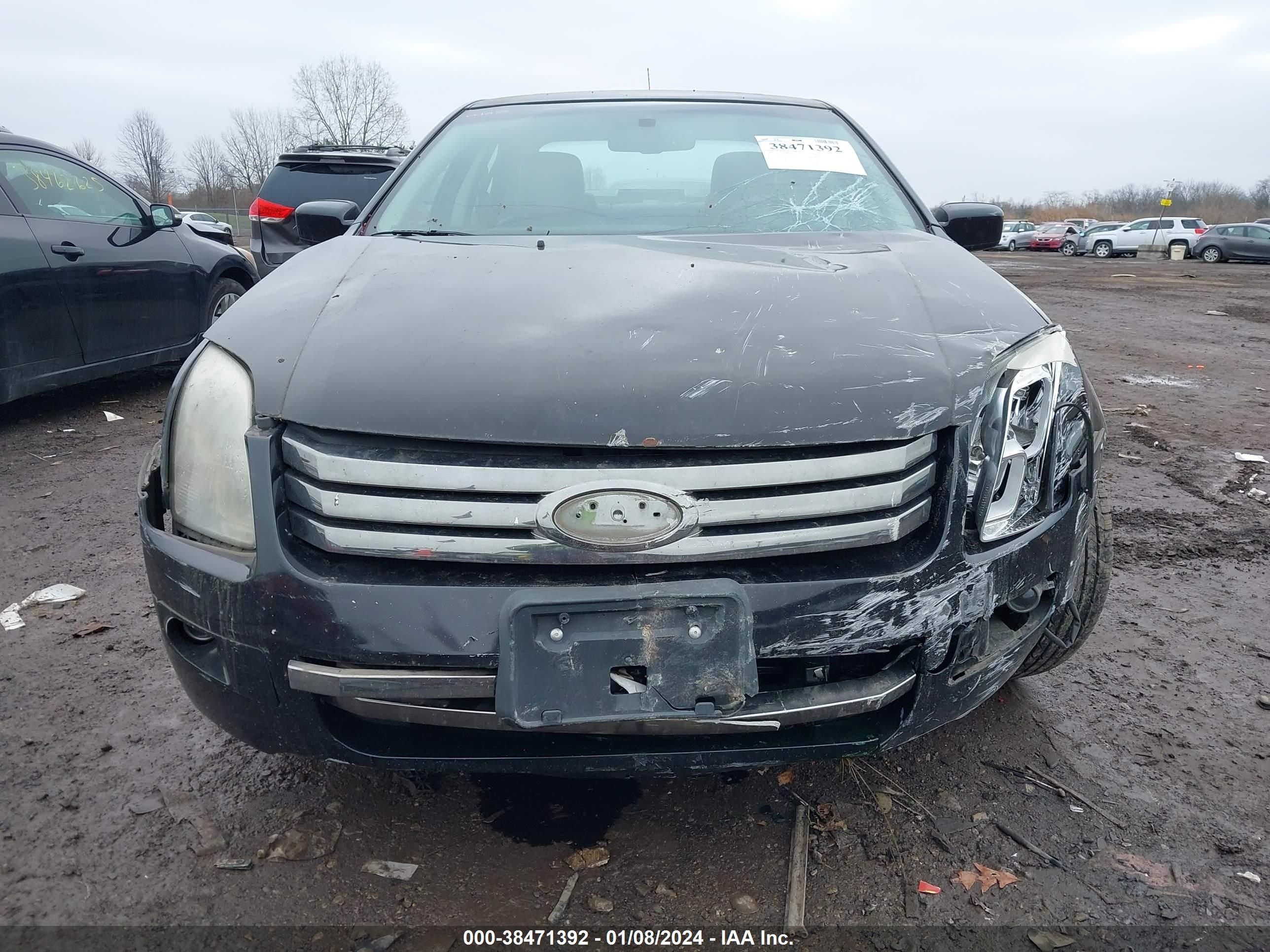 Photo 12 VIN: 3FAHP071X9R172813 - FORD FUSION 