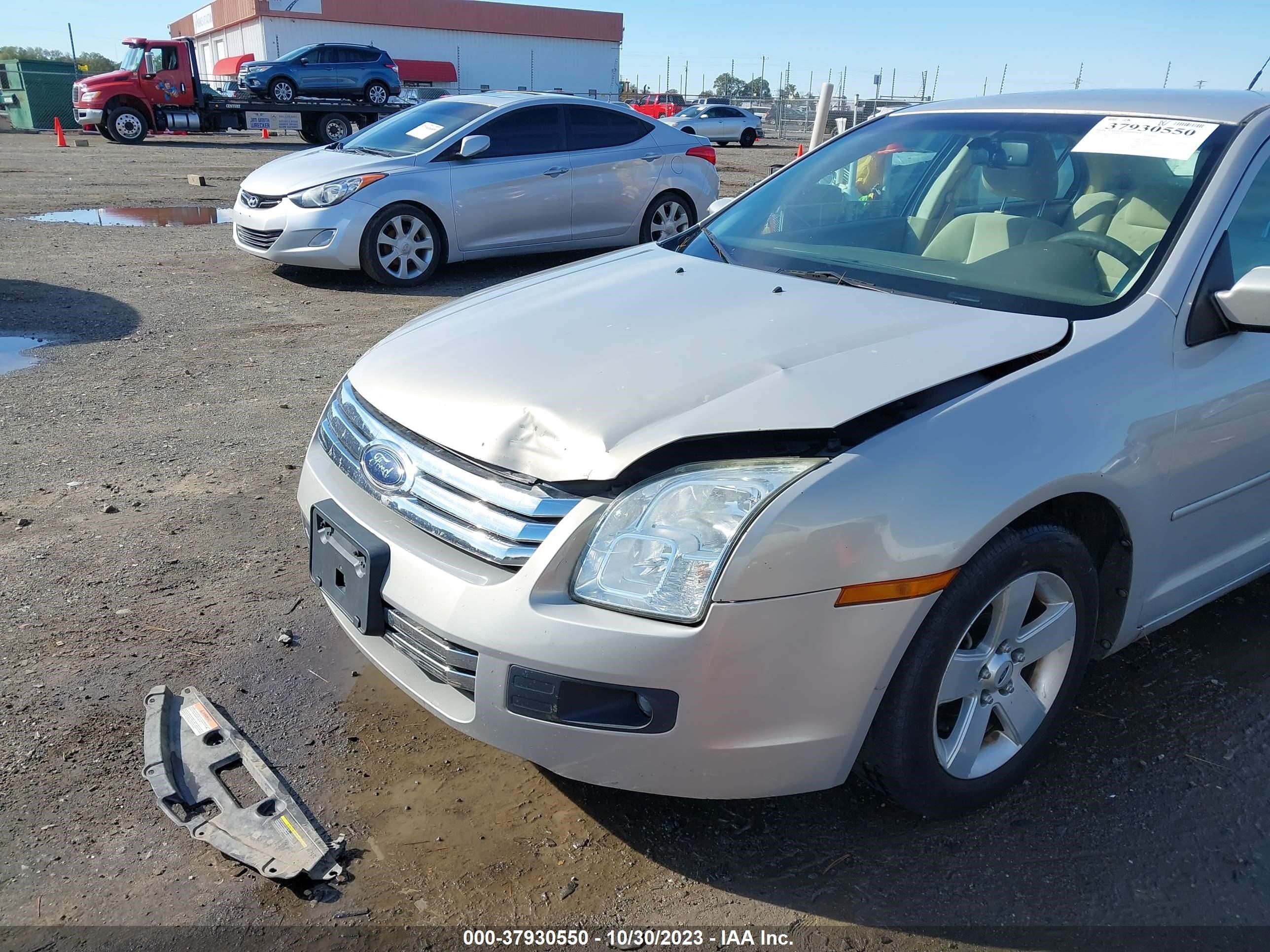 Photo 5 VIN: 3FAHP07Z09R215495 - FORD FUSION 