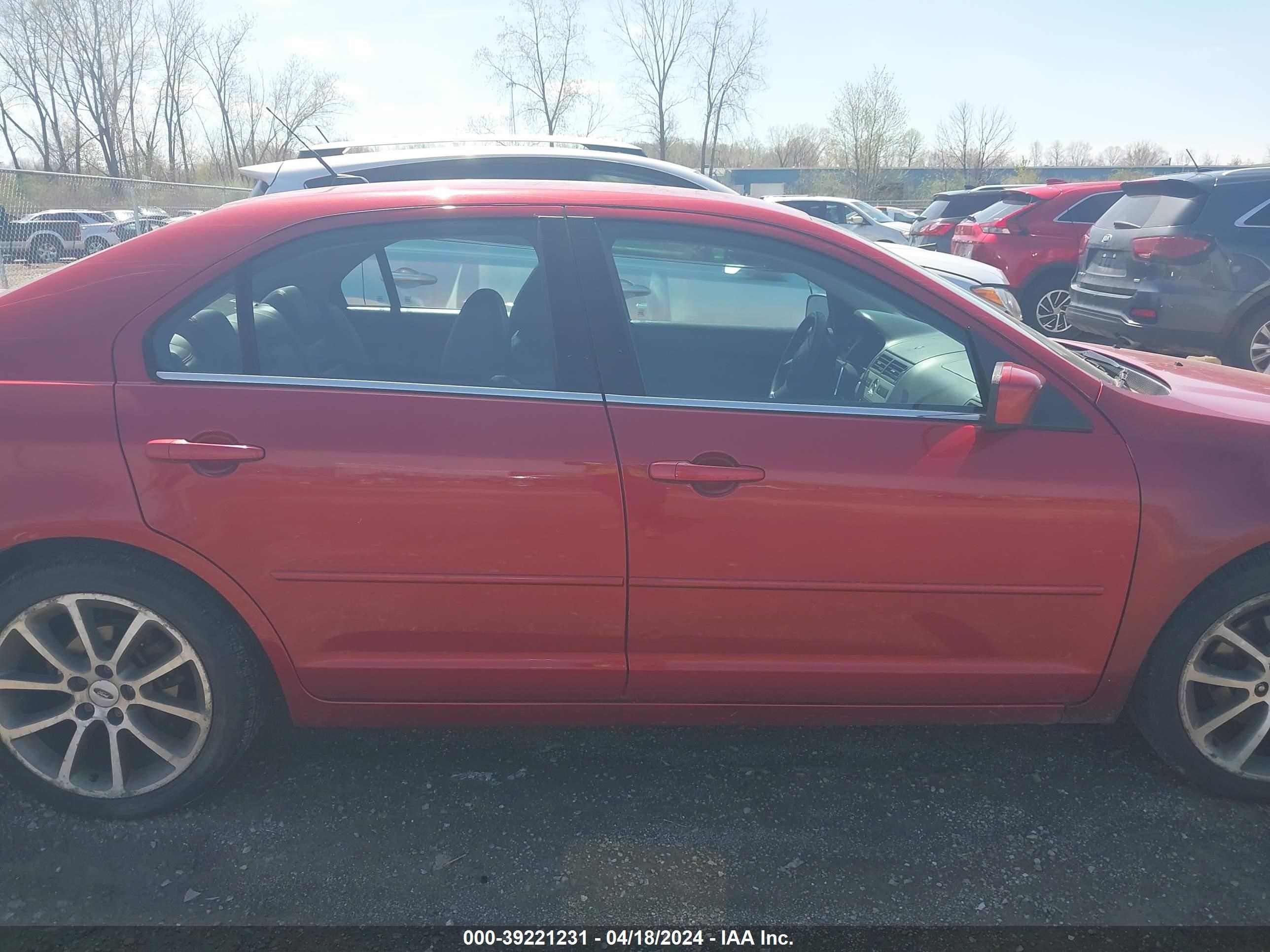 Photo 12 VIN: 3FAHP08119R102406 - FORD FUSION 