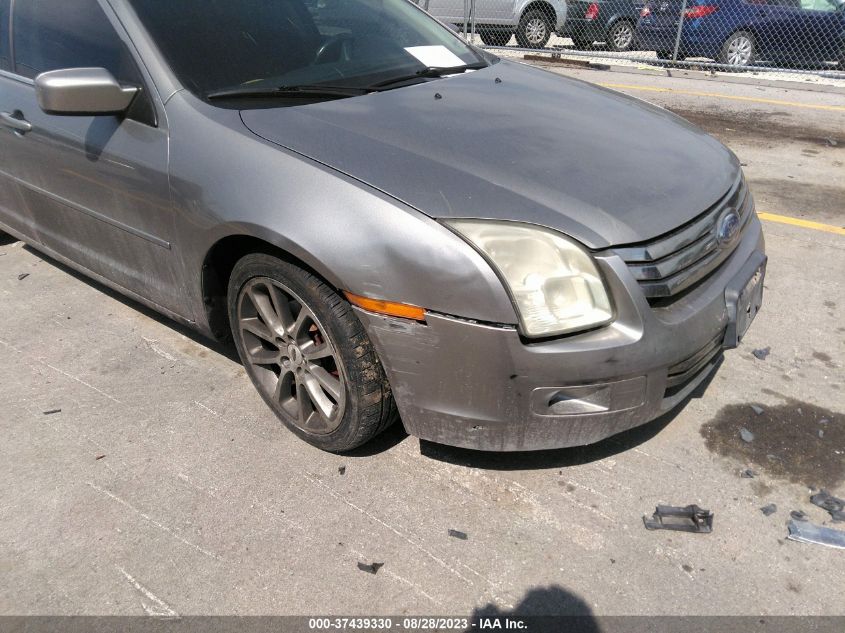 Photo 5 VIN: 3FAHP08138R221038 - FORD FUSION 