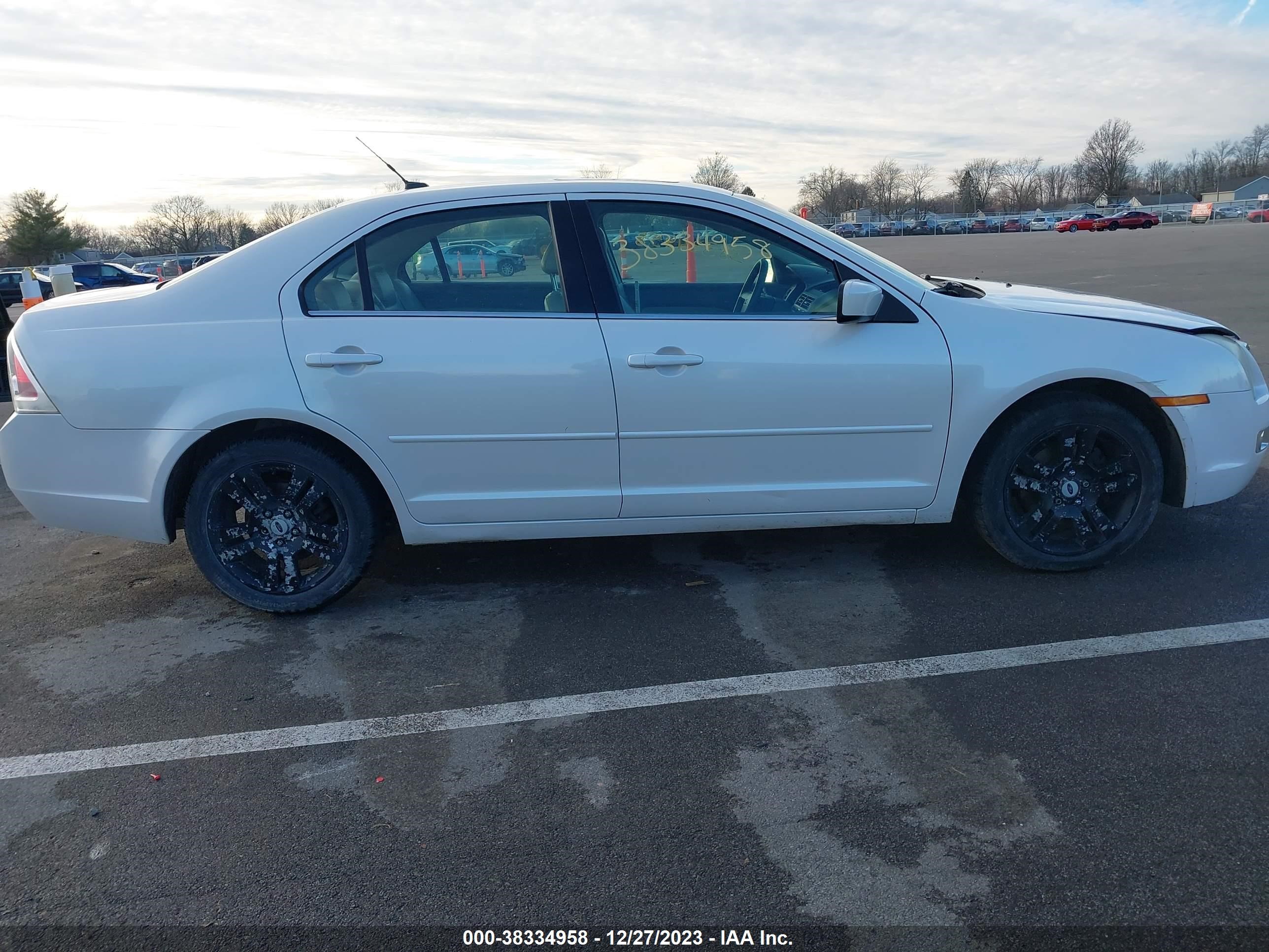 Photo 11 VIN: 3FAHP08159R150233 - FORD FUSION 