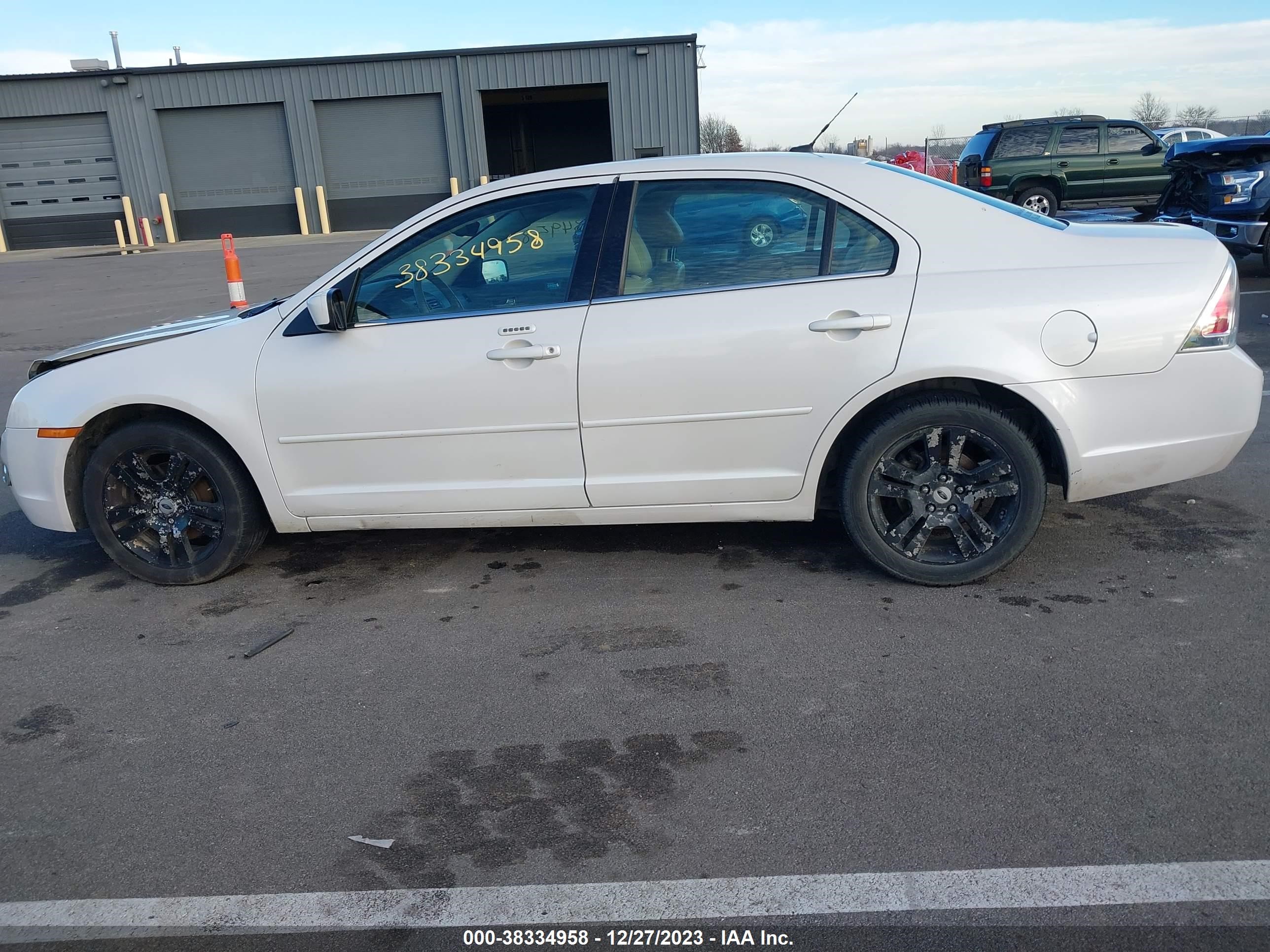 Photo 12 VIN: 3FAHP08159R150233 - FORD FUSION 