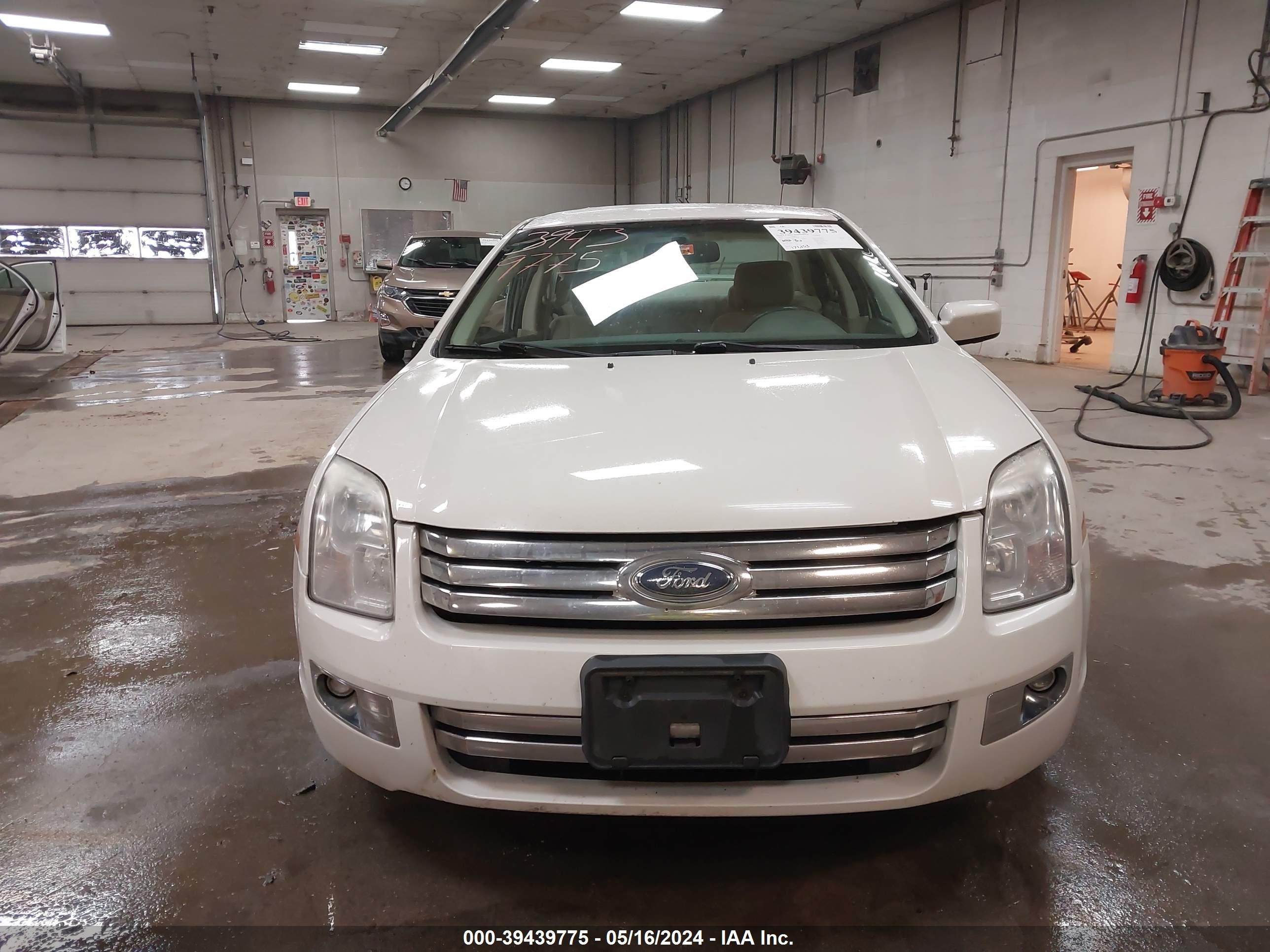 Photo 12 VIN: 3FAHP08178R204601 - FORD FUSION 