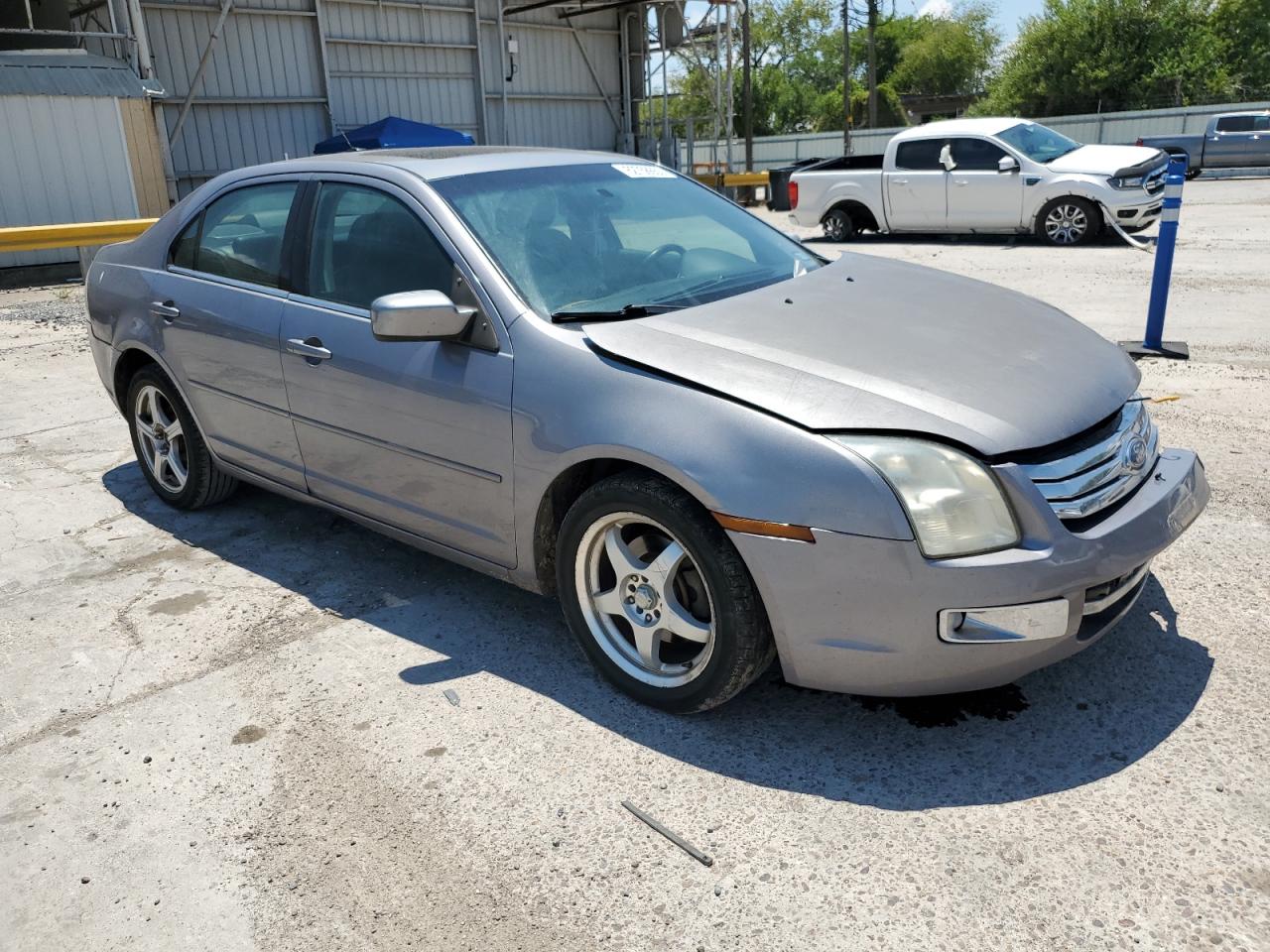 Photo 3 VIN: 3FAHP081X7R147454 - FORD FUSION 