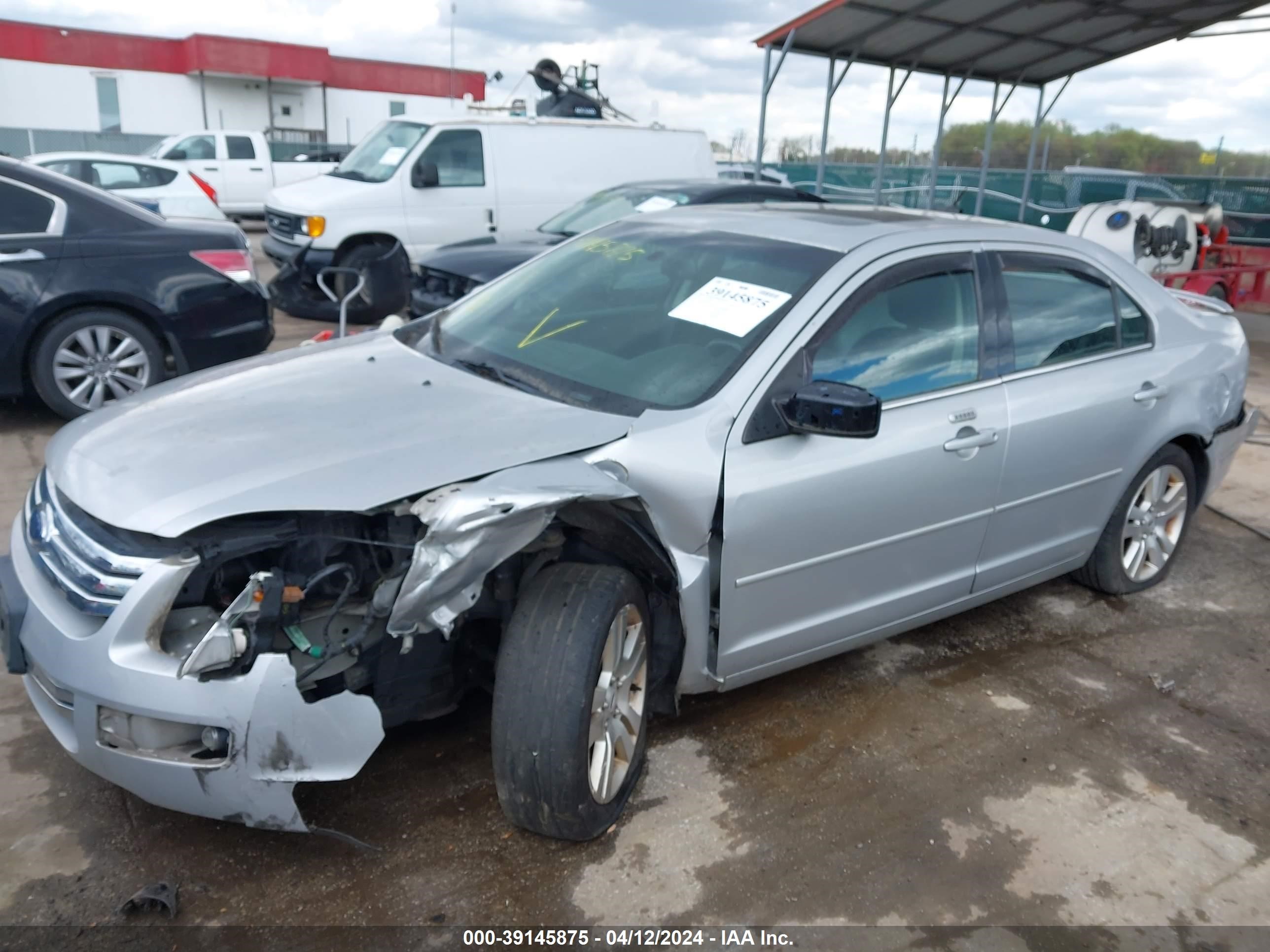 Photo 1 VIN: 3FAHP081X9R138773 - FORD FUSION 