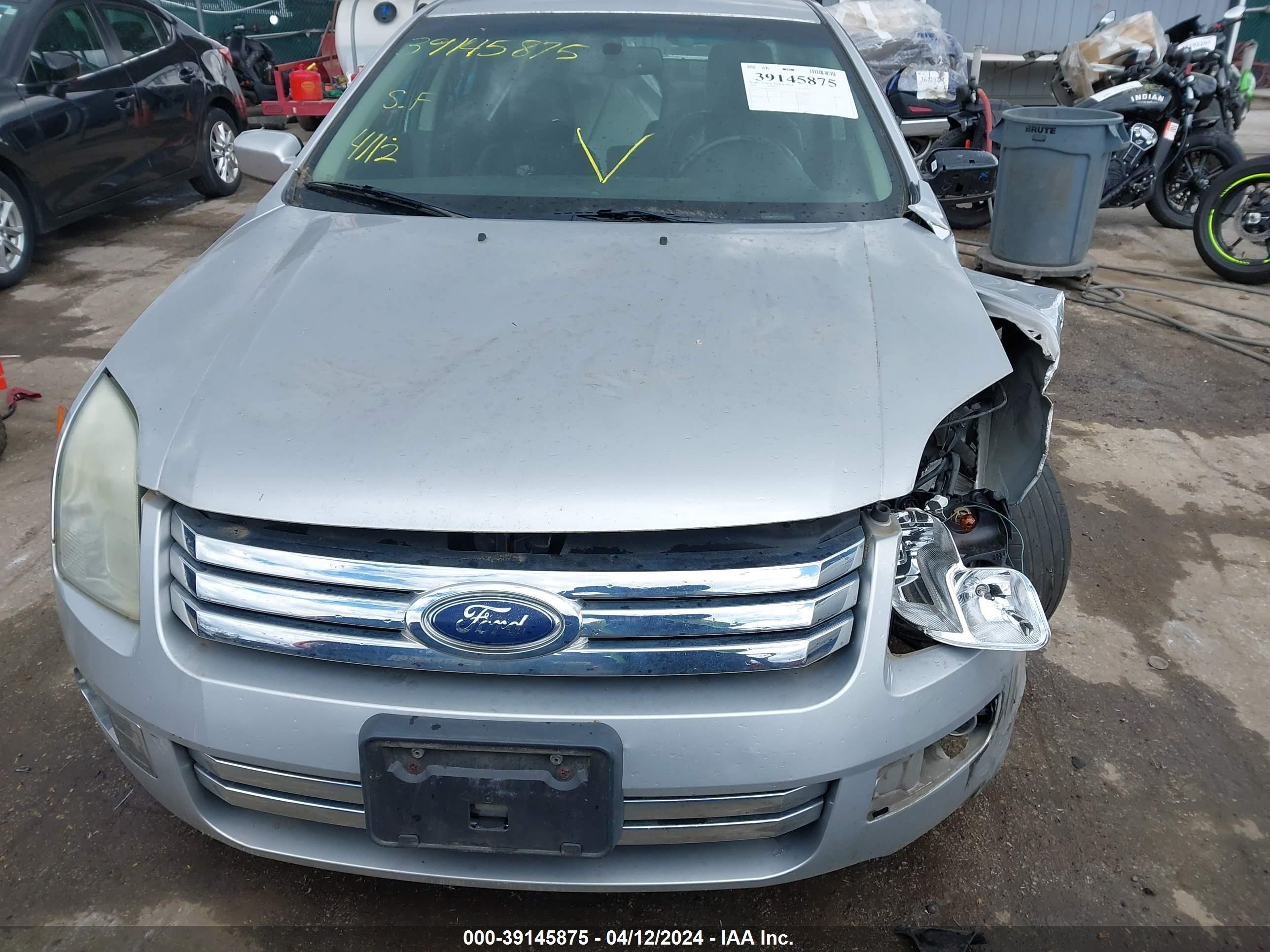 Photo 12 VIN: 3FAHP081X9R138773 - FORD FUSION 