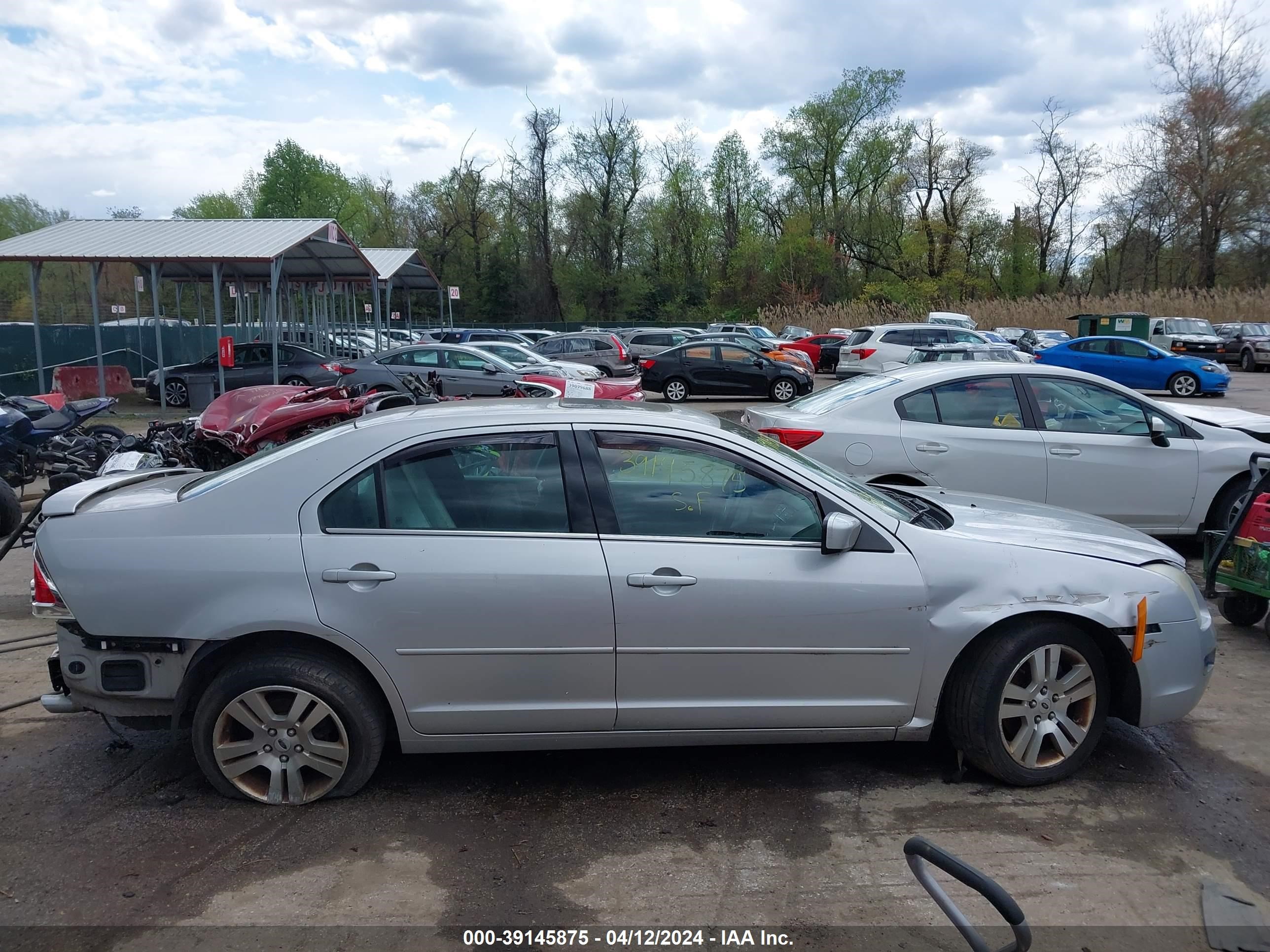 Photo 13 VIN: 3FAHP081X9R138773 - FORD FUSION 