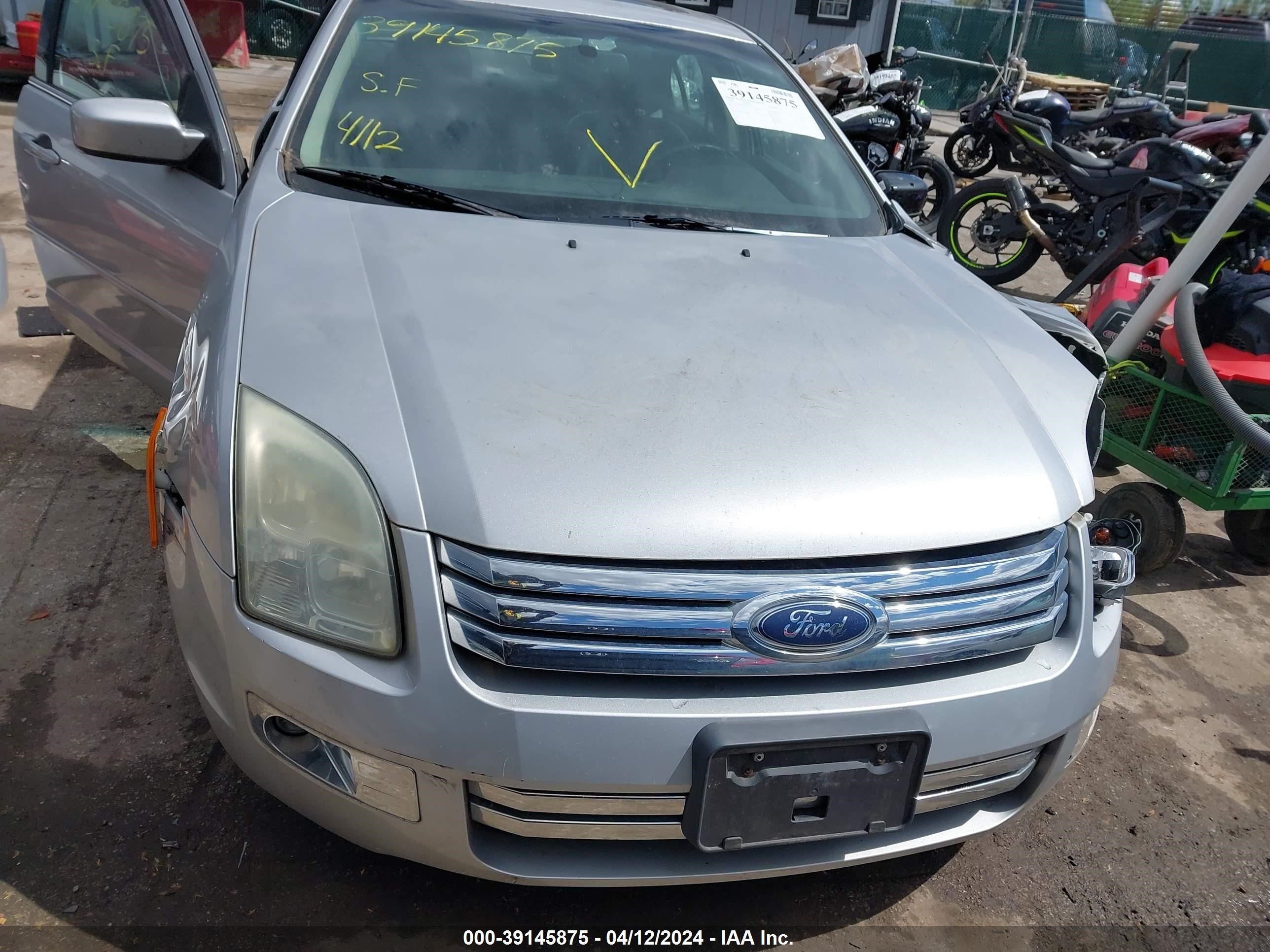 Photo 5 VIN: 3FAHP081X9R138773 - FORD FUSION 