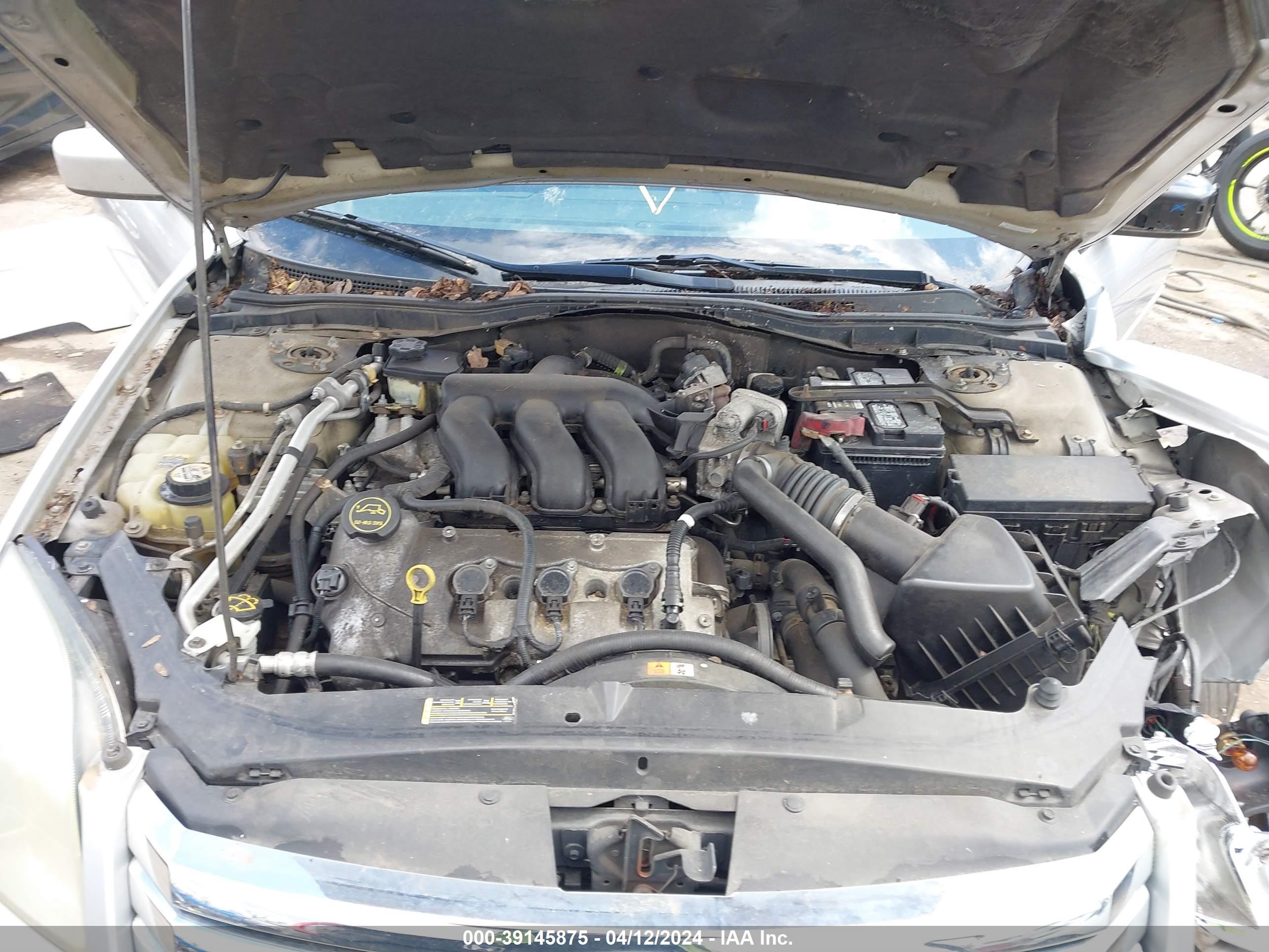 Photo 9 VIN: 3FAHP081X9R138773 - FORD FUSION 