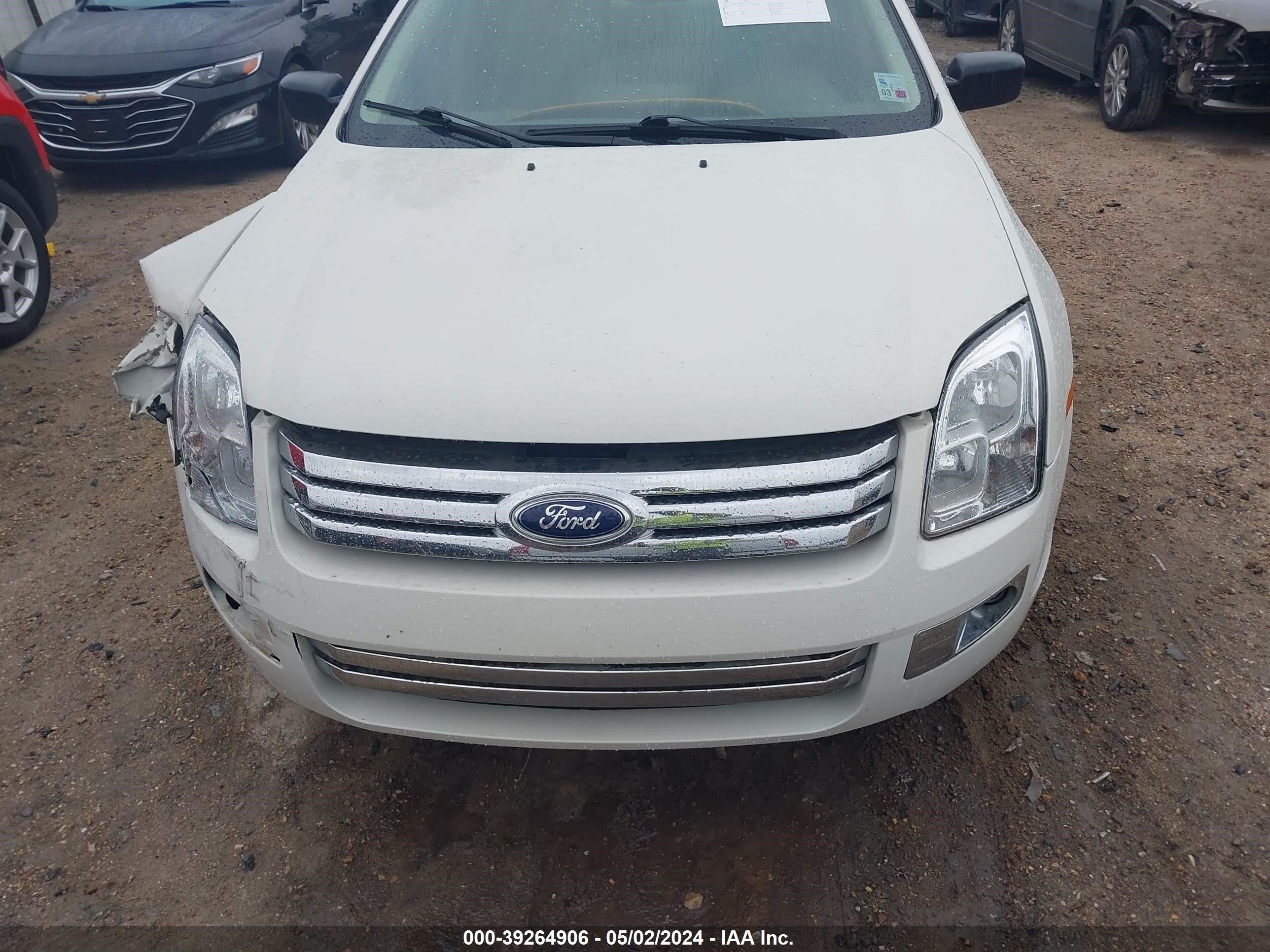 Photo 11 VIN: 3FAHP08Z19R216542 - FORD FUSION 