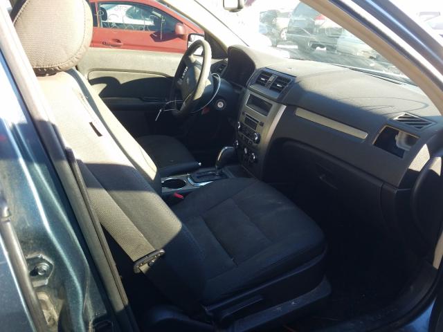 Photo 4 VIN: 3FAHP0HA2BR199704 - FORD FUSION SE 