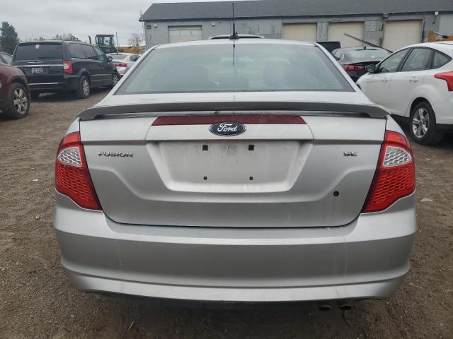 Photo 5 VIN: 3FAHP0HA4CR115657 - FORD FUSION SE 