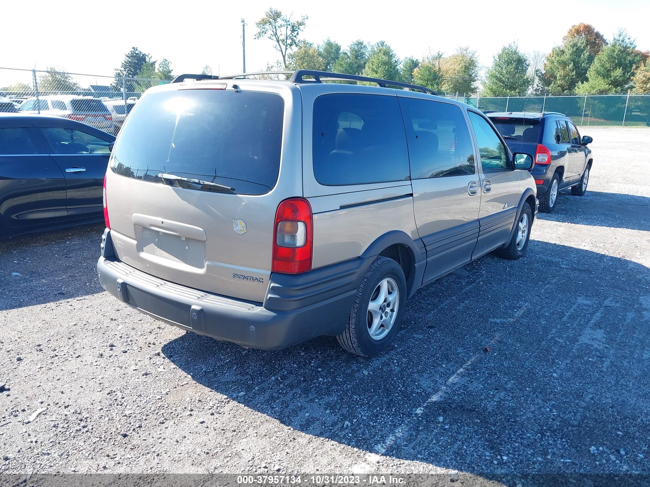 Photo 3 VIN: 3FAHP0HA4CR296551 - PONTIAC MONTANA 