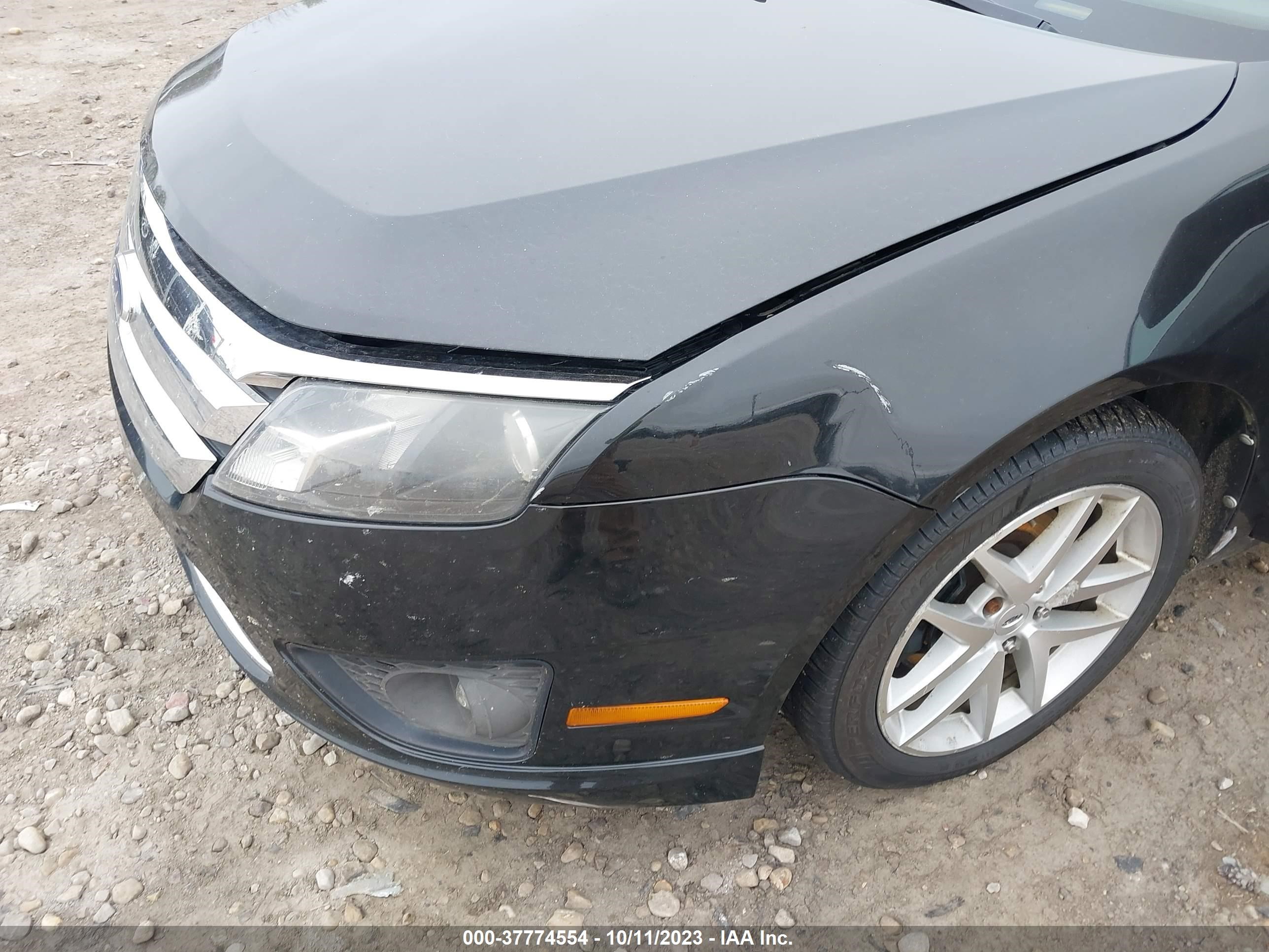 Photo 5 VIN: 3FAHP0HG9BR310544 - FORD FUSION 