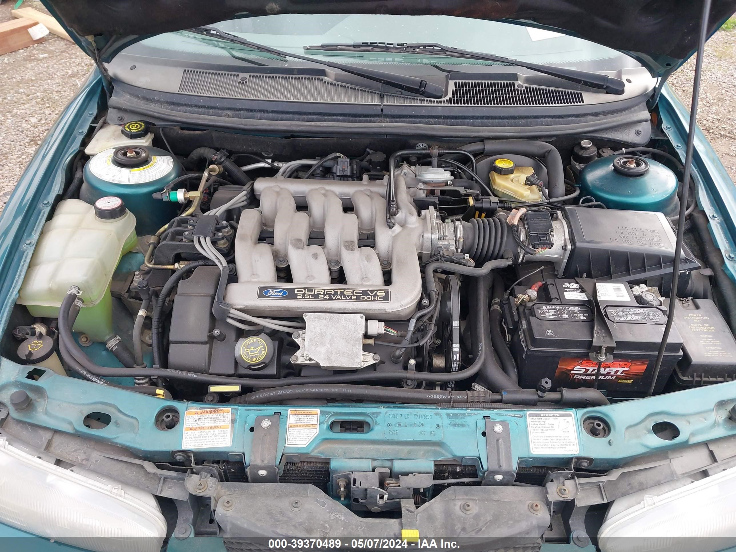 Photo 9 VIN: 3FALP66L3TM117687 - FORD CONTOUR 