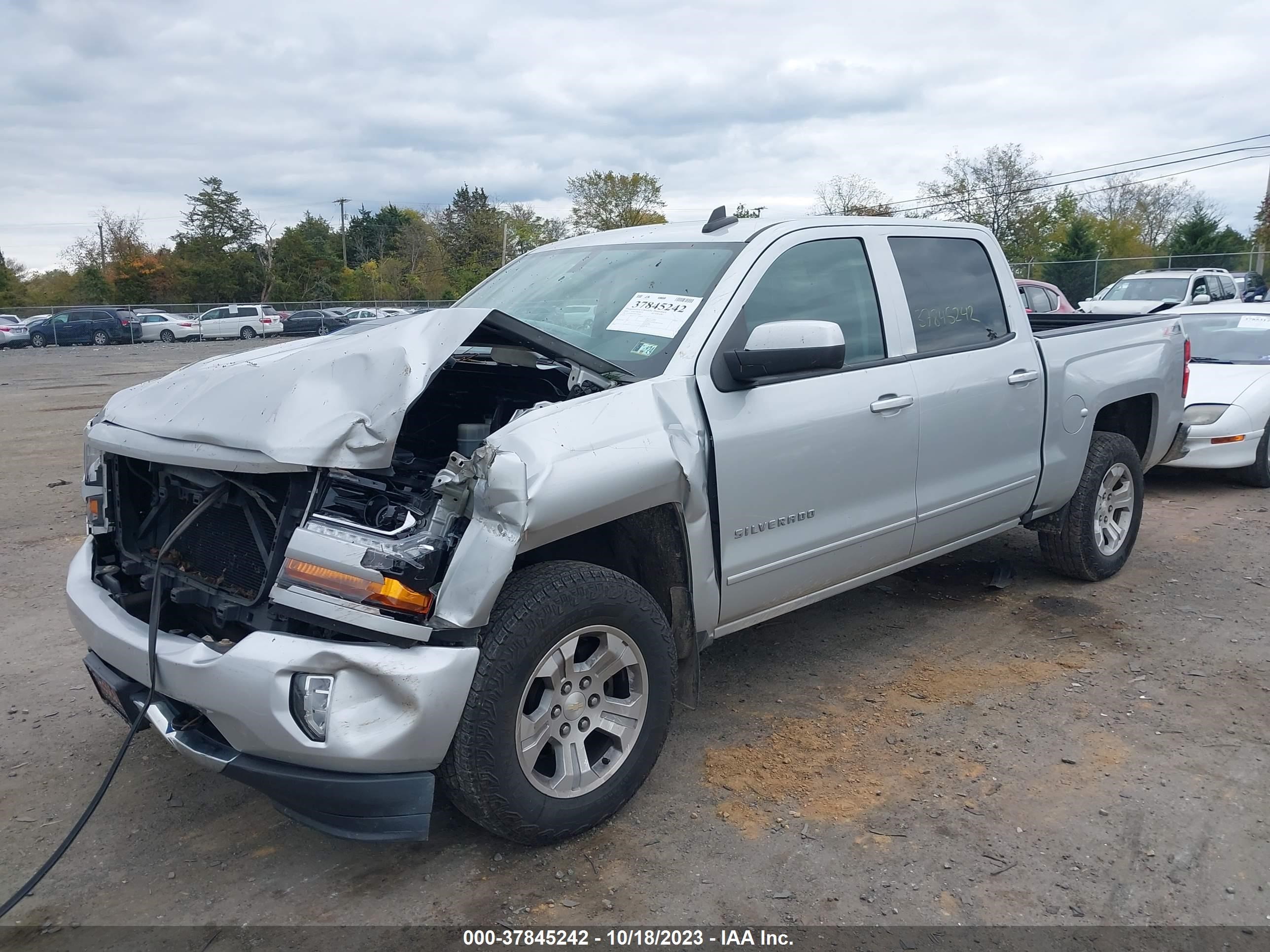 Photo 1 VIN: 3GCUKREC0GG136900 - CHEVROLET SILVERADO 