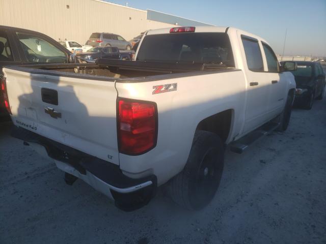 Photo 3 VIN: 3GCUKREC0GG307628 - CHEVROLET SILVERADO 