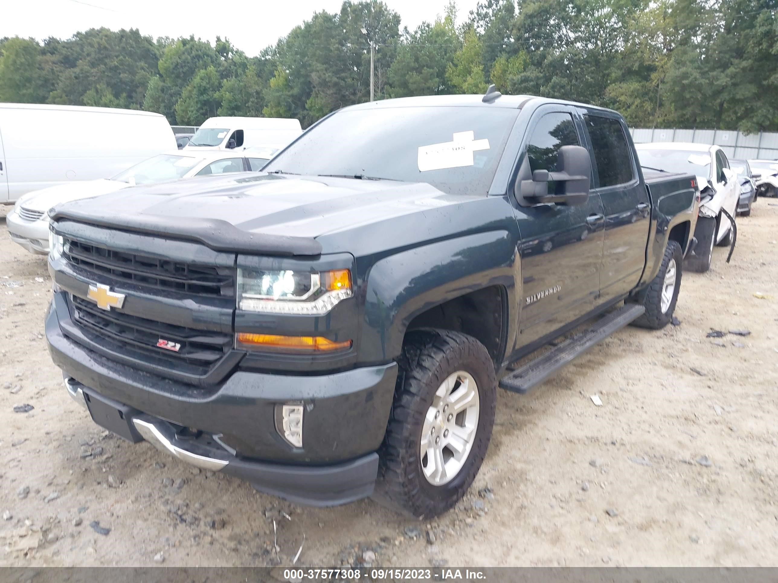 Photo 1 VIN: 3GCUKREC2JG569755 - CHEVROLET SILVERADO 