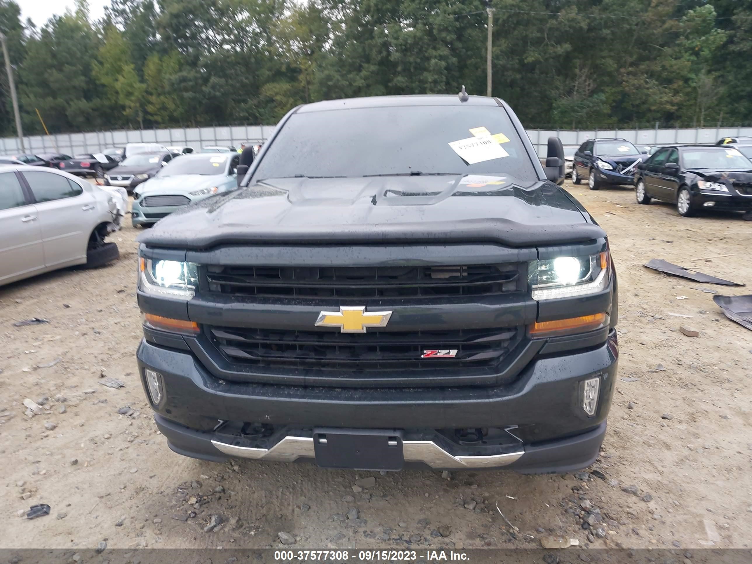 Photo 11 VIN: 3GCUKREC2JG569755 - CHEVROLET SILVERADO 