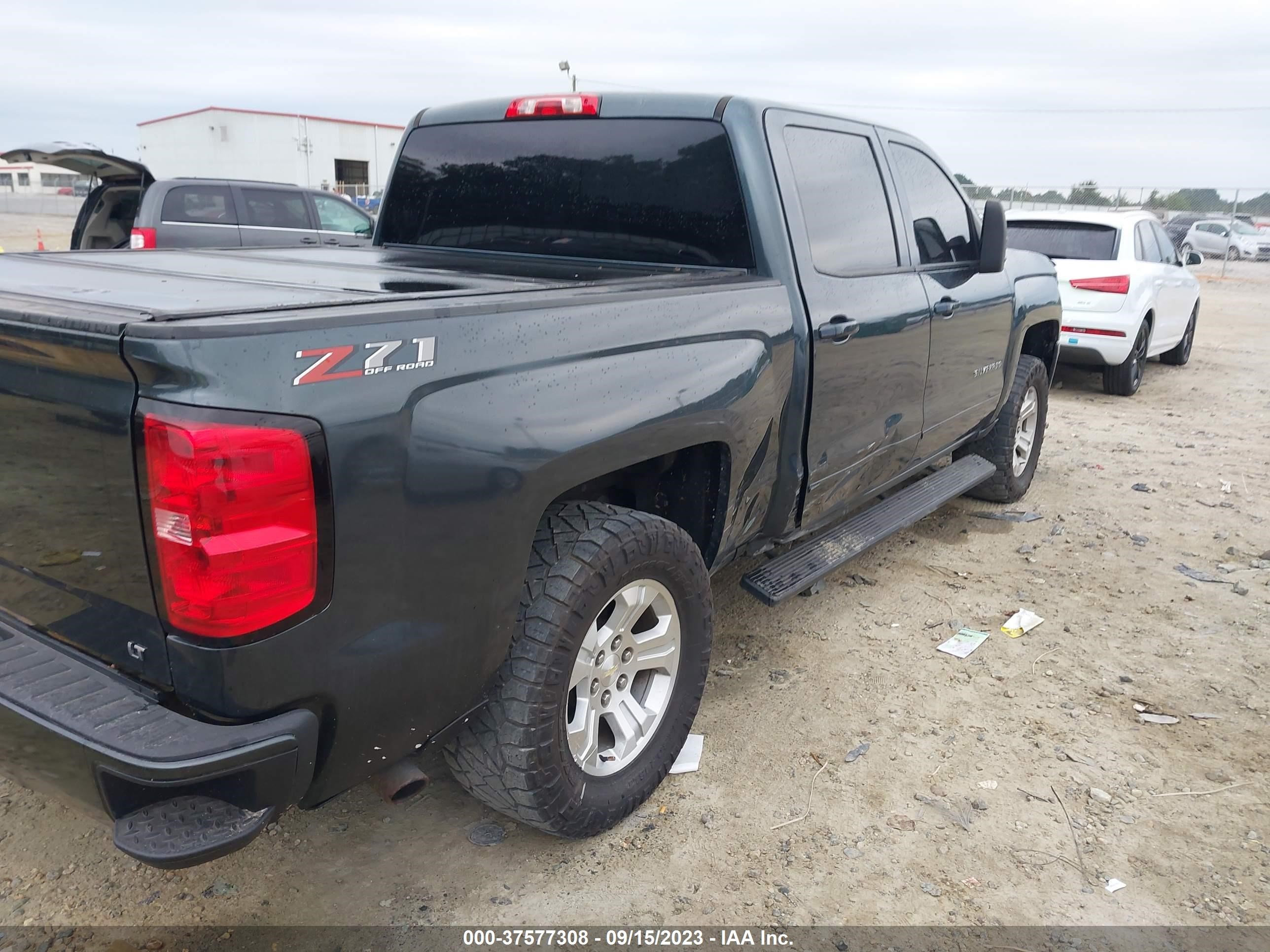 Photo 5 VIN: 3GCUKREC2JG569755 - CHEVROLET SILVERADO 