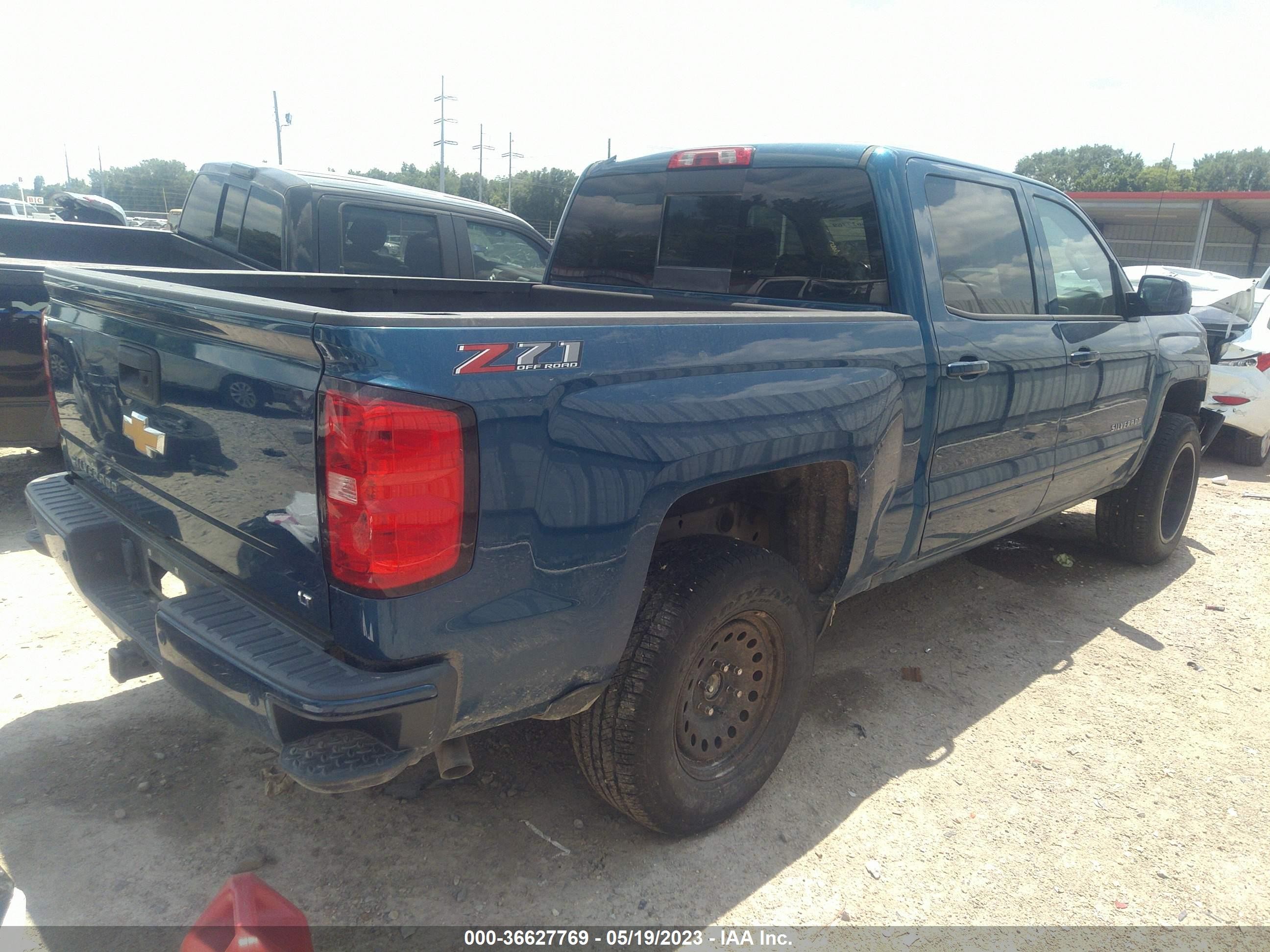 Photo 3 VIN: 3GCUKREC3JG347631 - CHEVROLET SILVERADO 