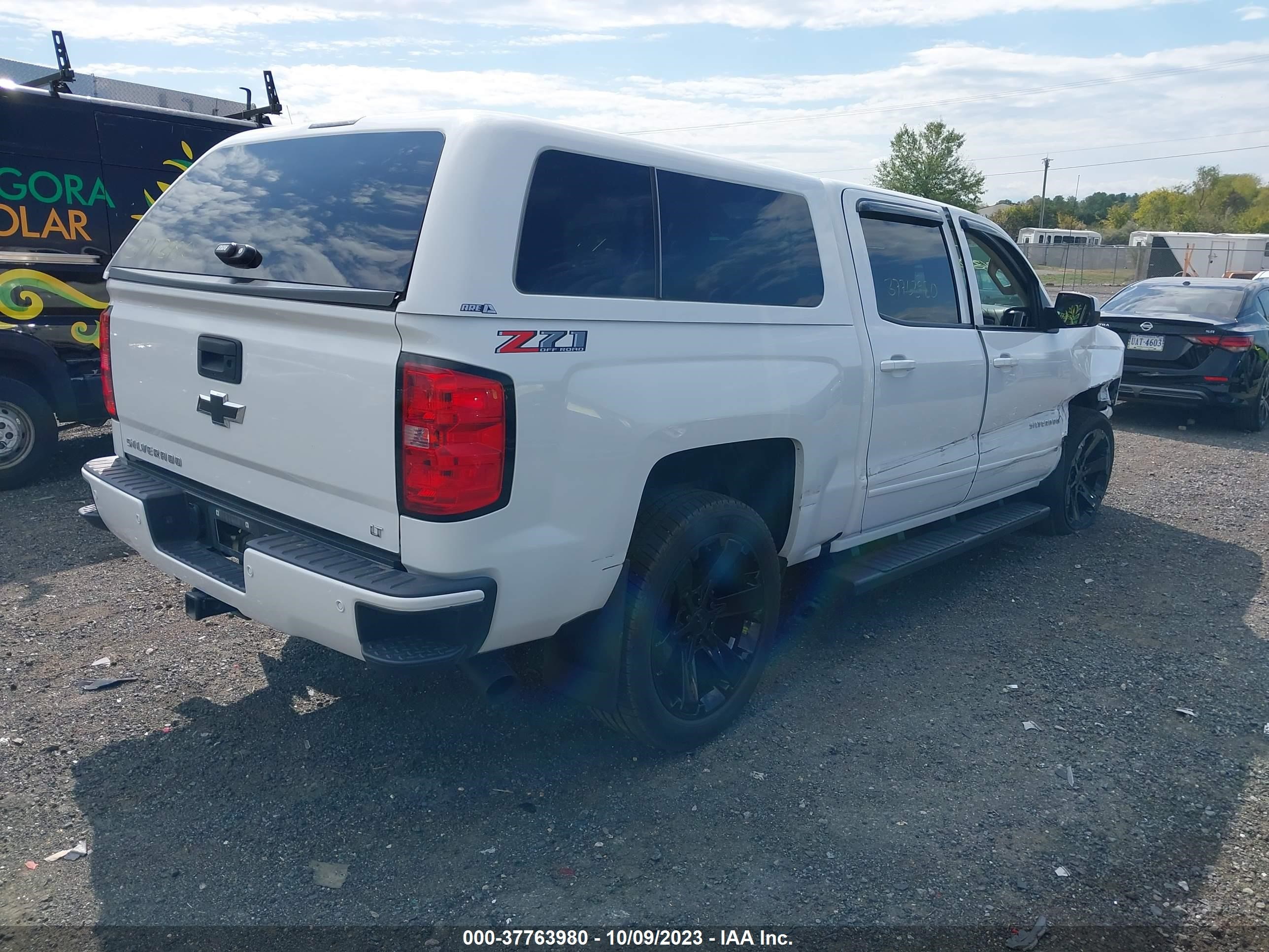 Photo 3 VIN: 3GCUKREC3JG570803 - CHEVROLET SILVERADO 1500 