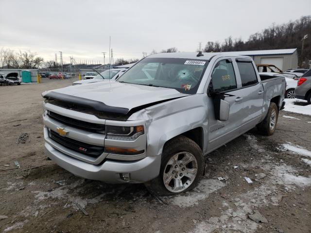 Photo 1 VIN: 3GCUKREC4GG208584 - CHEVROLET SILVERADO 