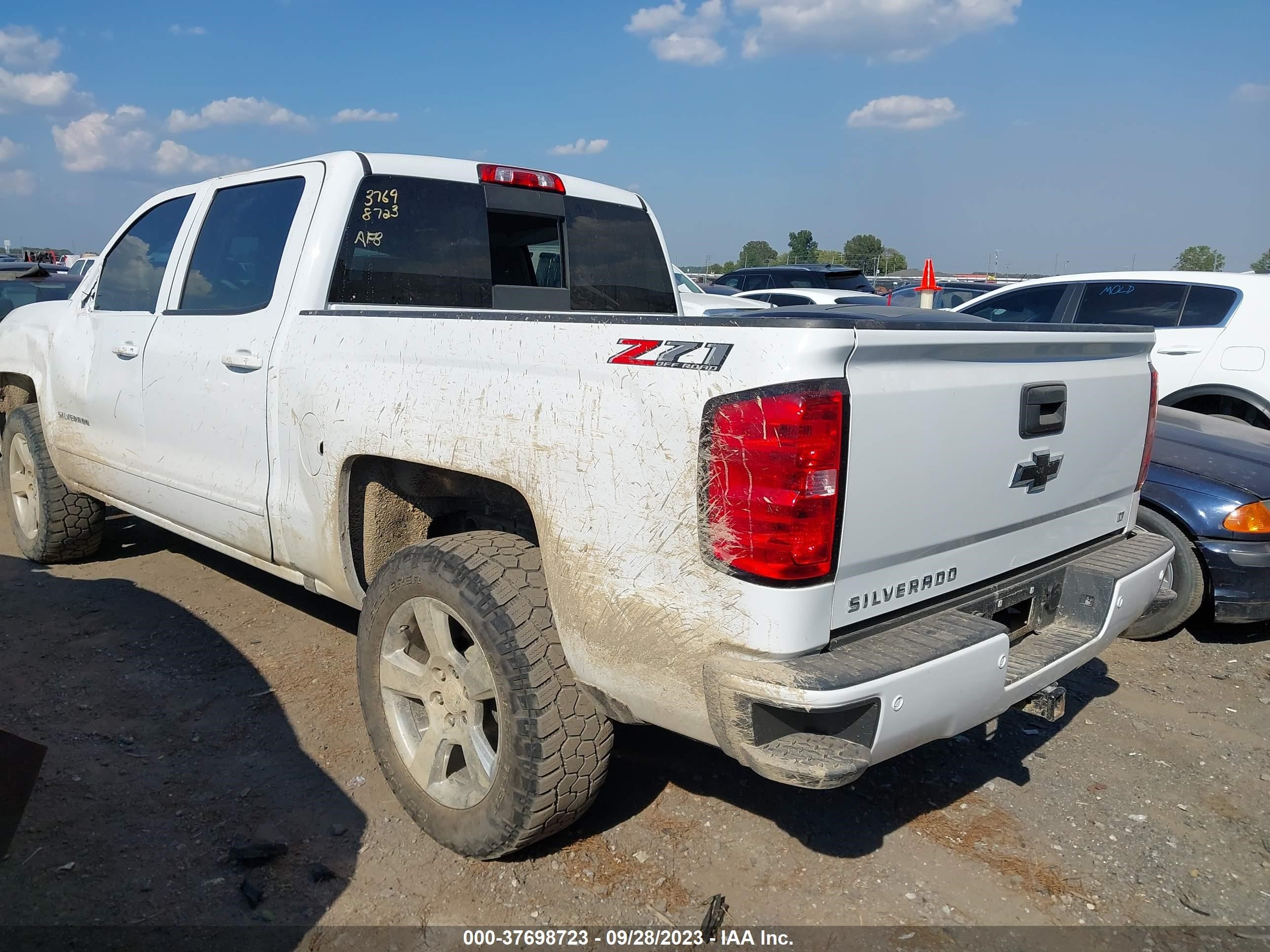 Photo 1 VIN: 3GCUKREC4JG490765 - CHEVROLET SILVERADO 