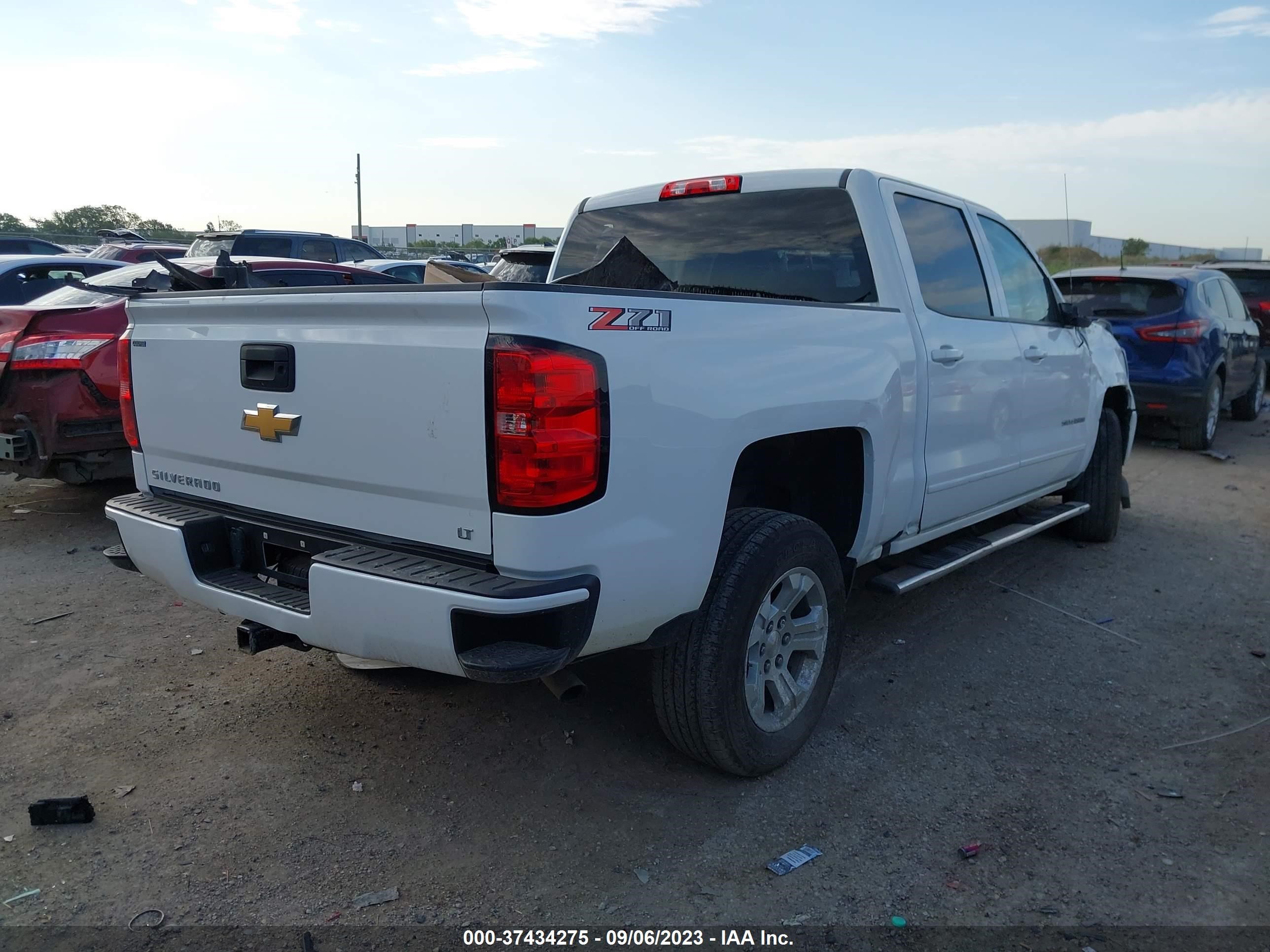 Photo 3 VIN: 3GCUKREC5JG442529 - CHEVROLET SILVERADO 