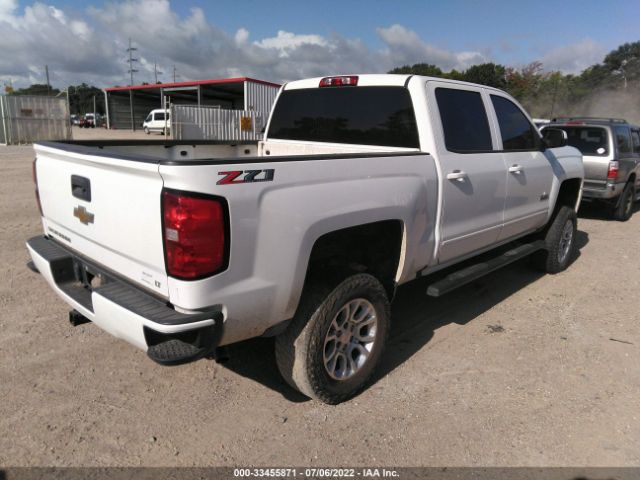 Photo 3 VIN: 3GCUKREC6JG380395 - CHEVROLET SILVERADO 1500 