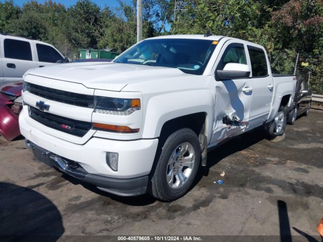 Photo 1 VIN: 3GCUKREC6JG586199 - CHEVROLET SILVERADO 