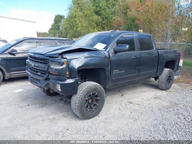 Photo 1 VIN: 3GCUKREC9JG330235 - CHEVROLET SILVERADO 1500 