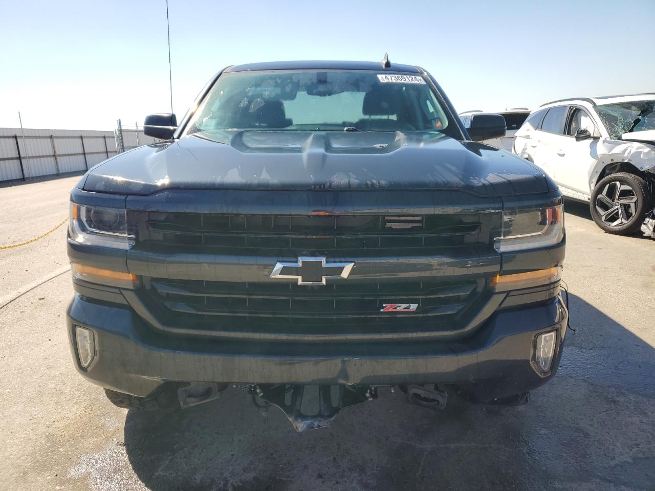 Photo 4 VIN: 3GCUKREC9JG350100 - CHEVROLET SILVERADO 