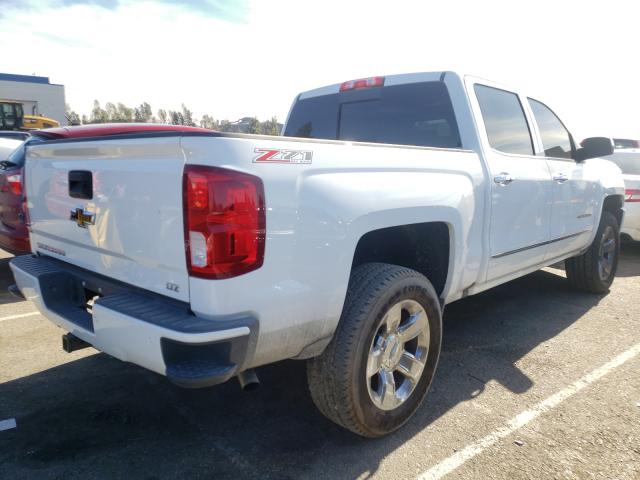 Photo 3 VIN: 3GCUKSEC3GG223262 - CHEVROLET SILVERADO 