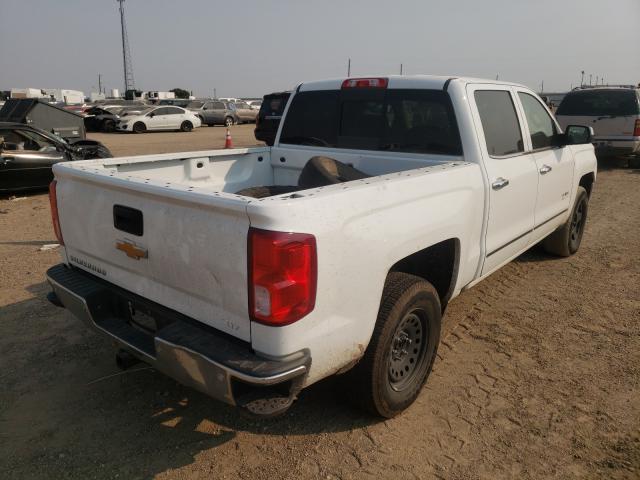 Photo 3 VIN: 3GCUKSEC9JG125957 - CHEVROLET SILVERADO 