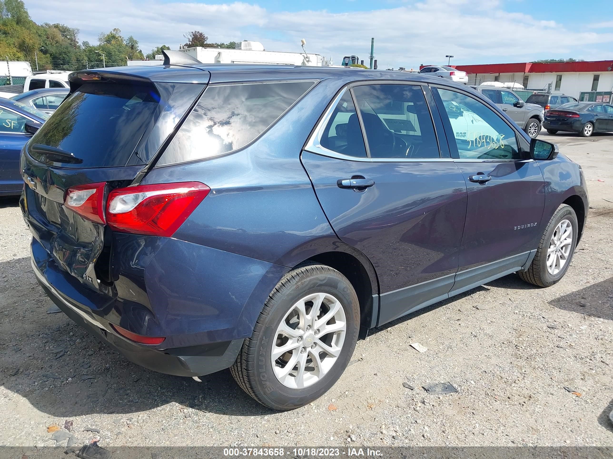 Photo 3 VIN: 3GNAXSEV3JS611710 - CHEVROLET EQUINOX 