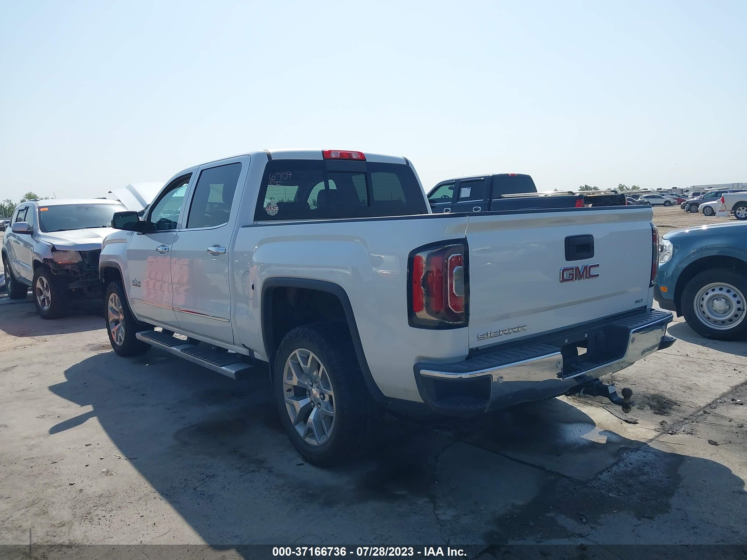 Photo 2 VIN: 3GTU2NEC5JG618178 - GMC SIERRA 