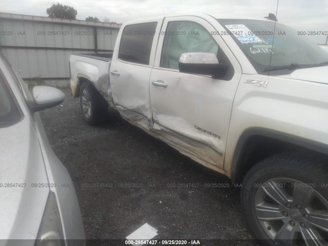 Photo 5 VIN: 3GTU2NEC7JG234144 - GMC SIERRA 1500 