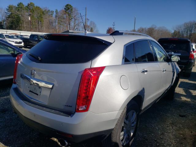 Photo 3 VIN: 3GYFNAE30CS530982 - CADILLAC SRX LUXURY 