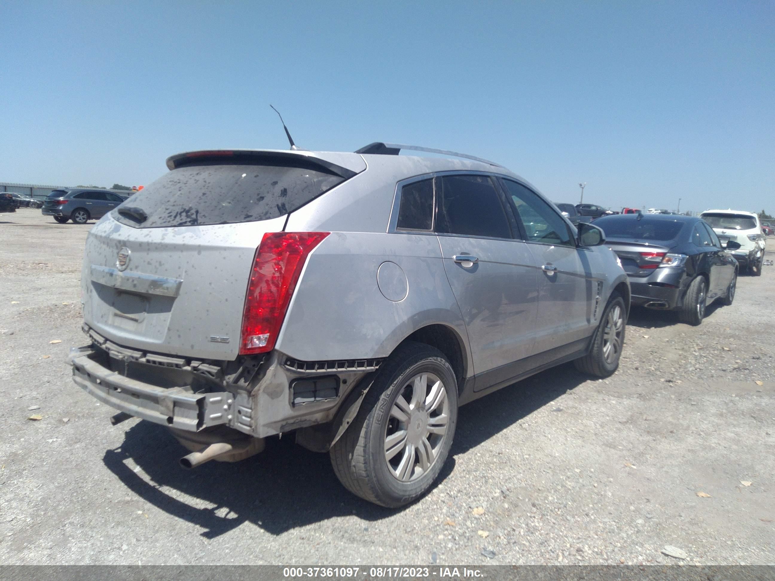 Photo 3 VIN: 3GYFNAE30CS641659 - CADILLAC SRX 