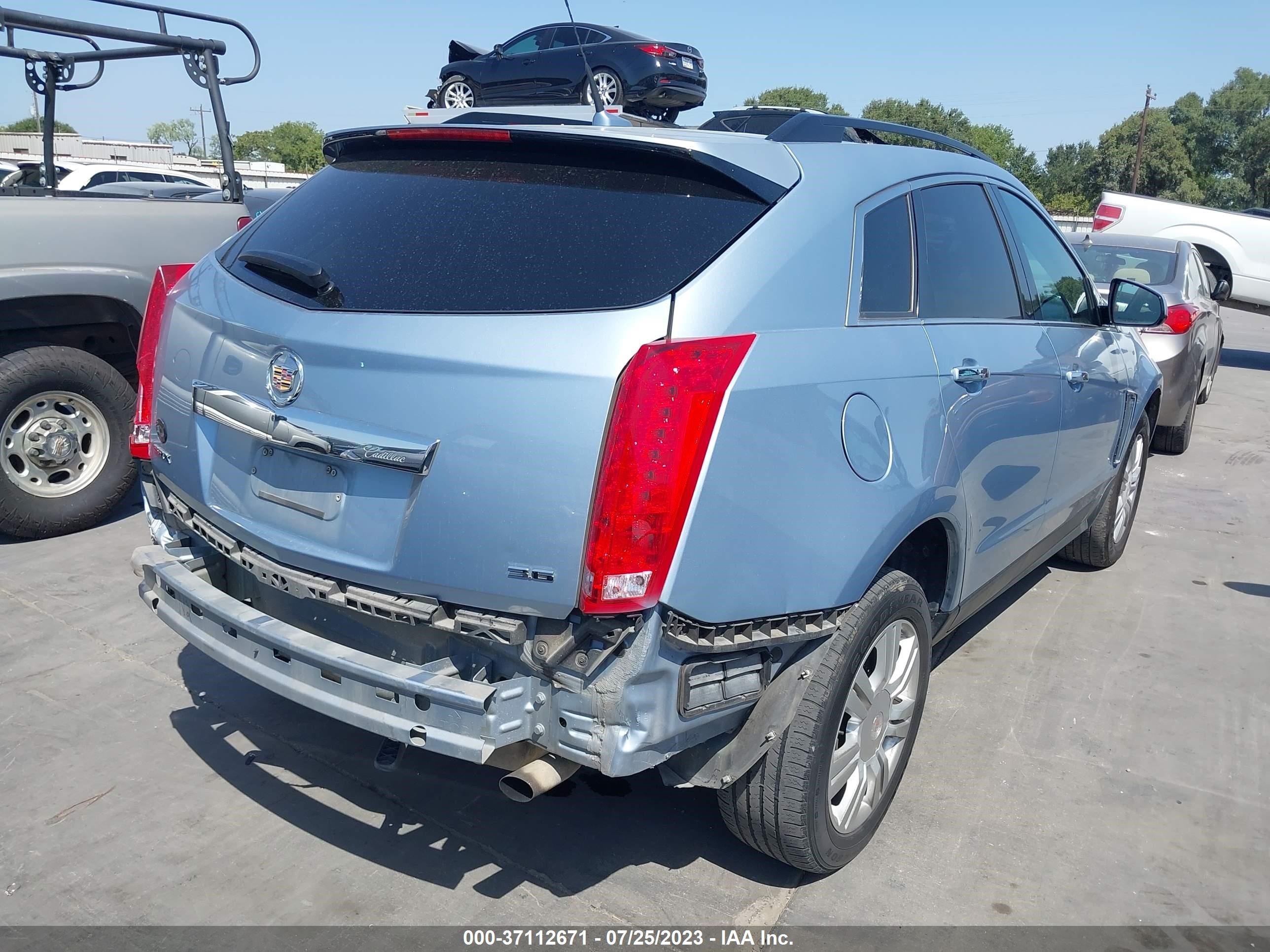 Photo 3 VIN: 3GYFNAE30DS559268 - CADILLAC SRX 