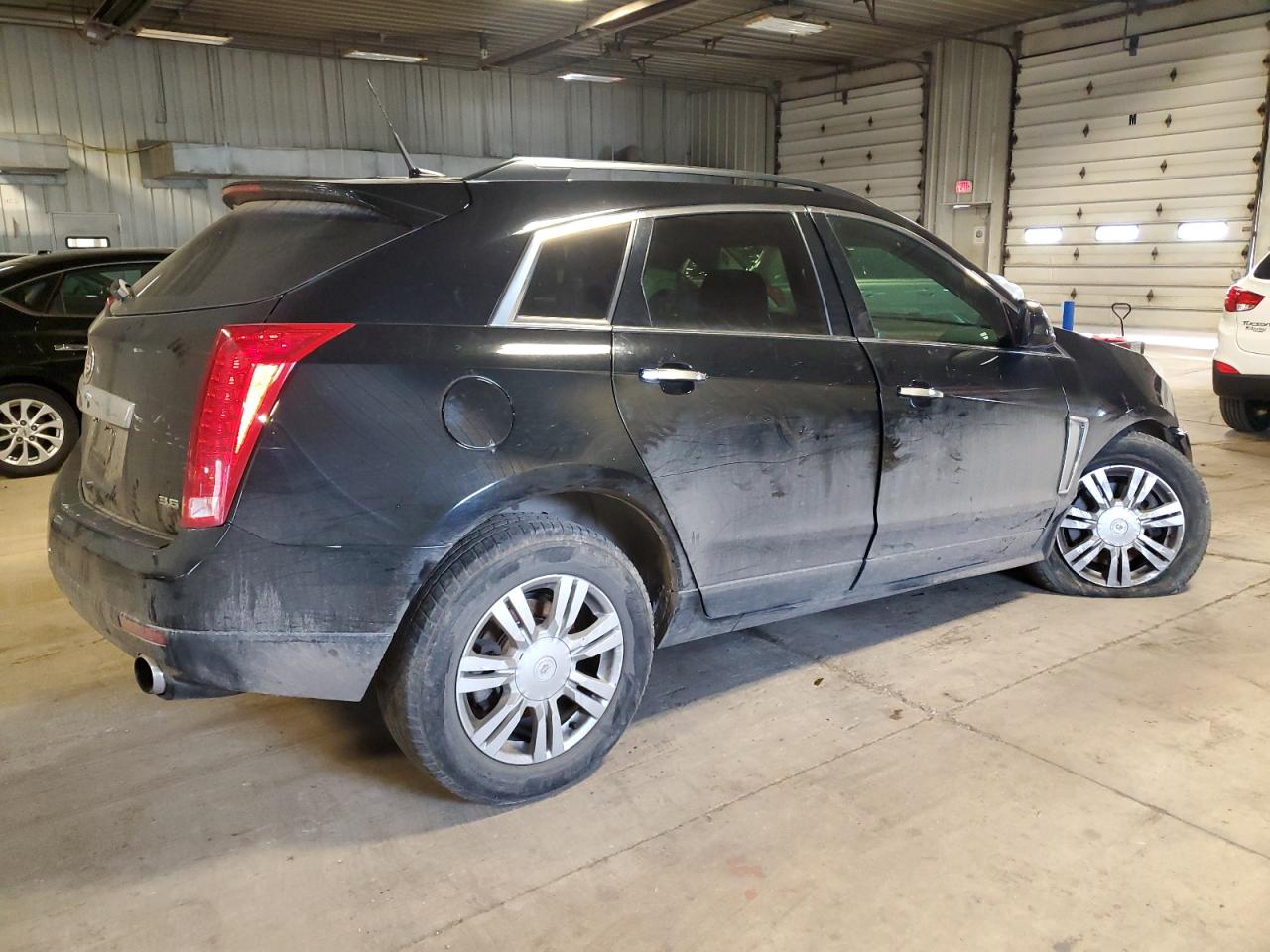 Photo 2 VIN: 3GYFNAE30DS642781 - CADILLAC SRX 